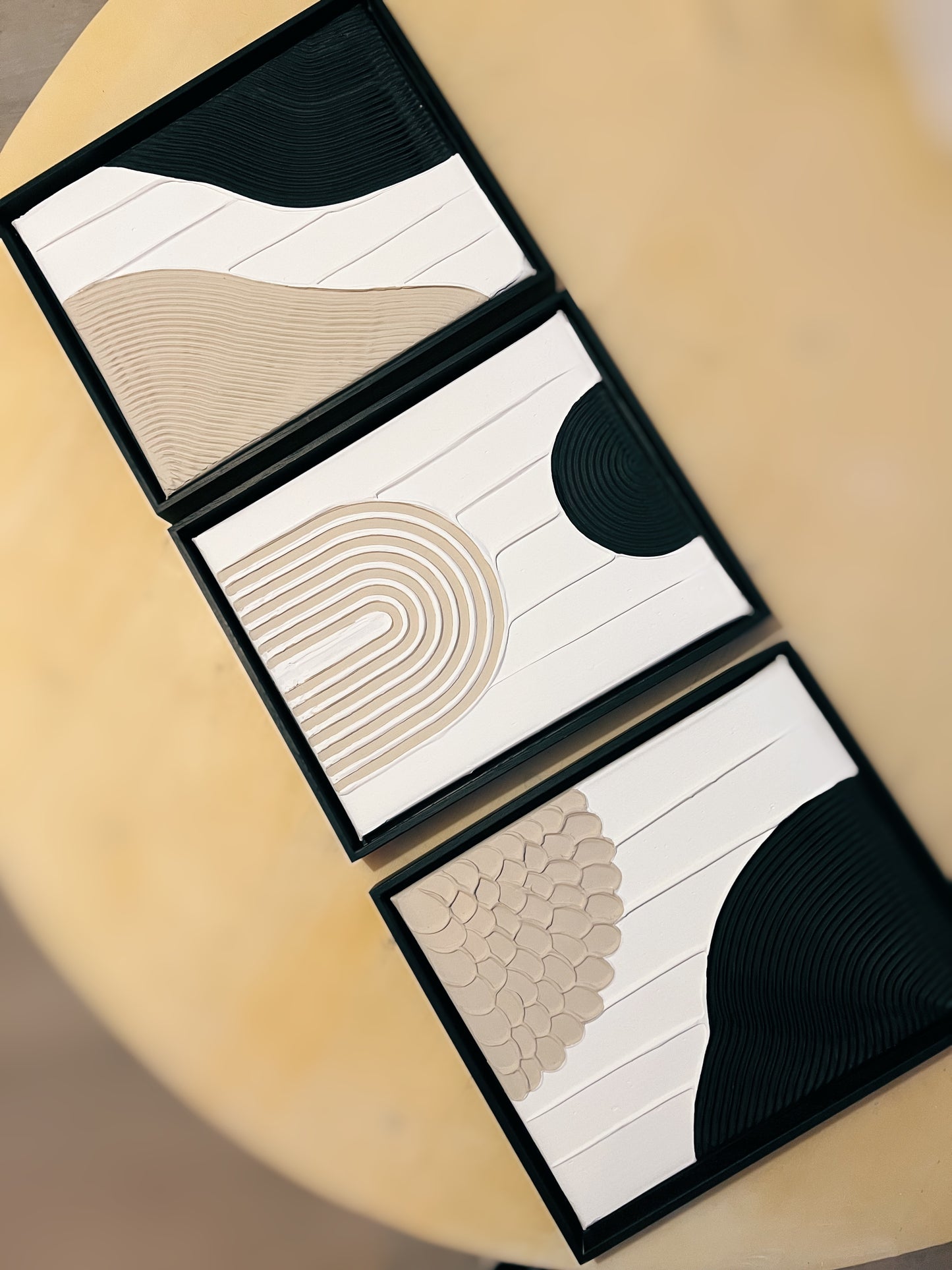 set of three in black, white, and beige – a striking collection of minimalist, modern textured art pieces that bring balance and elegance to any room.