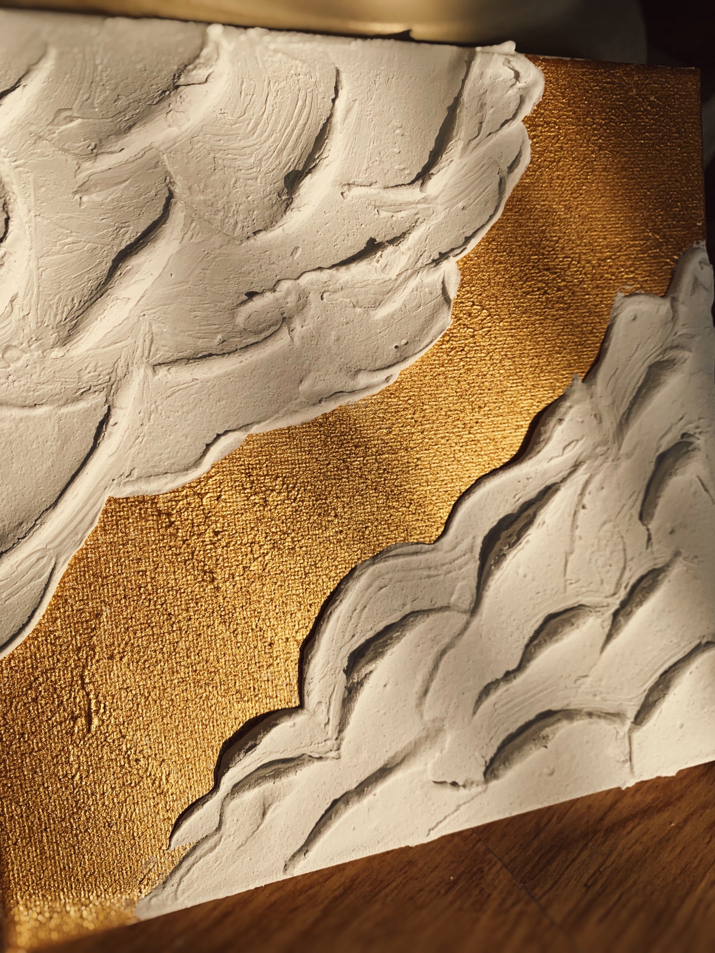 Transform your space with GOLDIE – a modern, textured wall art piece crafted to add elegance and sophistication to any interior. Featuring a striking combination of gold and white, this artwork is designed to bring warmth and radiance to your decor. Made on a rectangular or square canvas, GOLDIE offers versatile display options, allowing it to be hung either horizontally or vertically to perfectly suit your space.