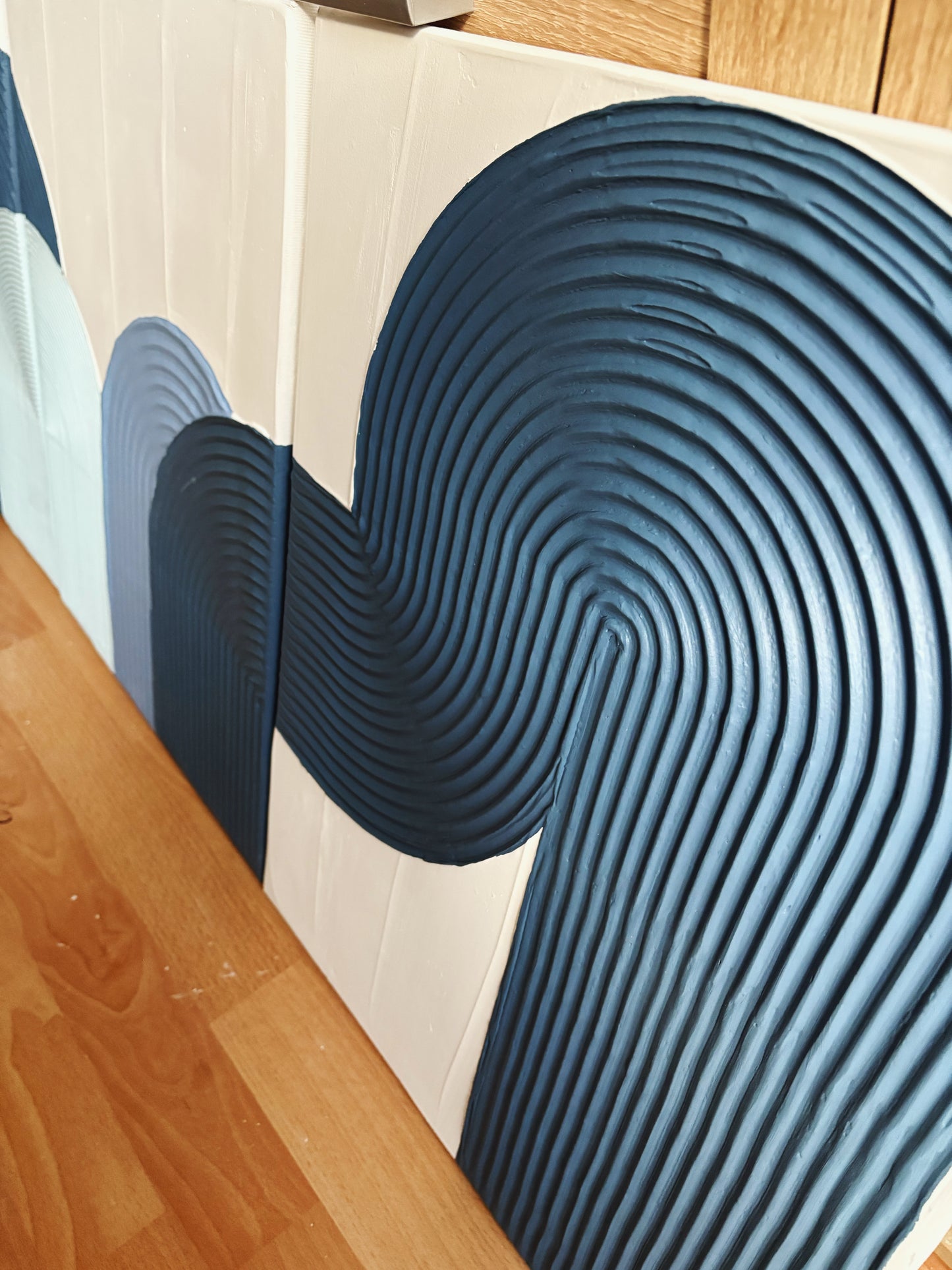 Blue textured wall art set
Coastal-inspired abstract paintings
Handcrafted 3D diptych artwork
Modern arched wall decor
Set of 3 minimalist blue art pieces
Beach house wall decor
Framed blue textured canvas set
Large coastal abstract artwork
Handmade ocean-inspired wall decor
Serene modern wall art in shades of blue