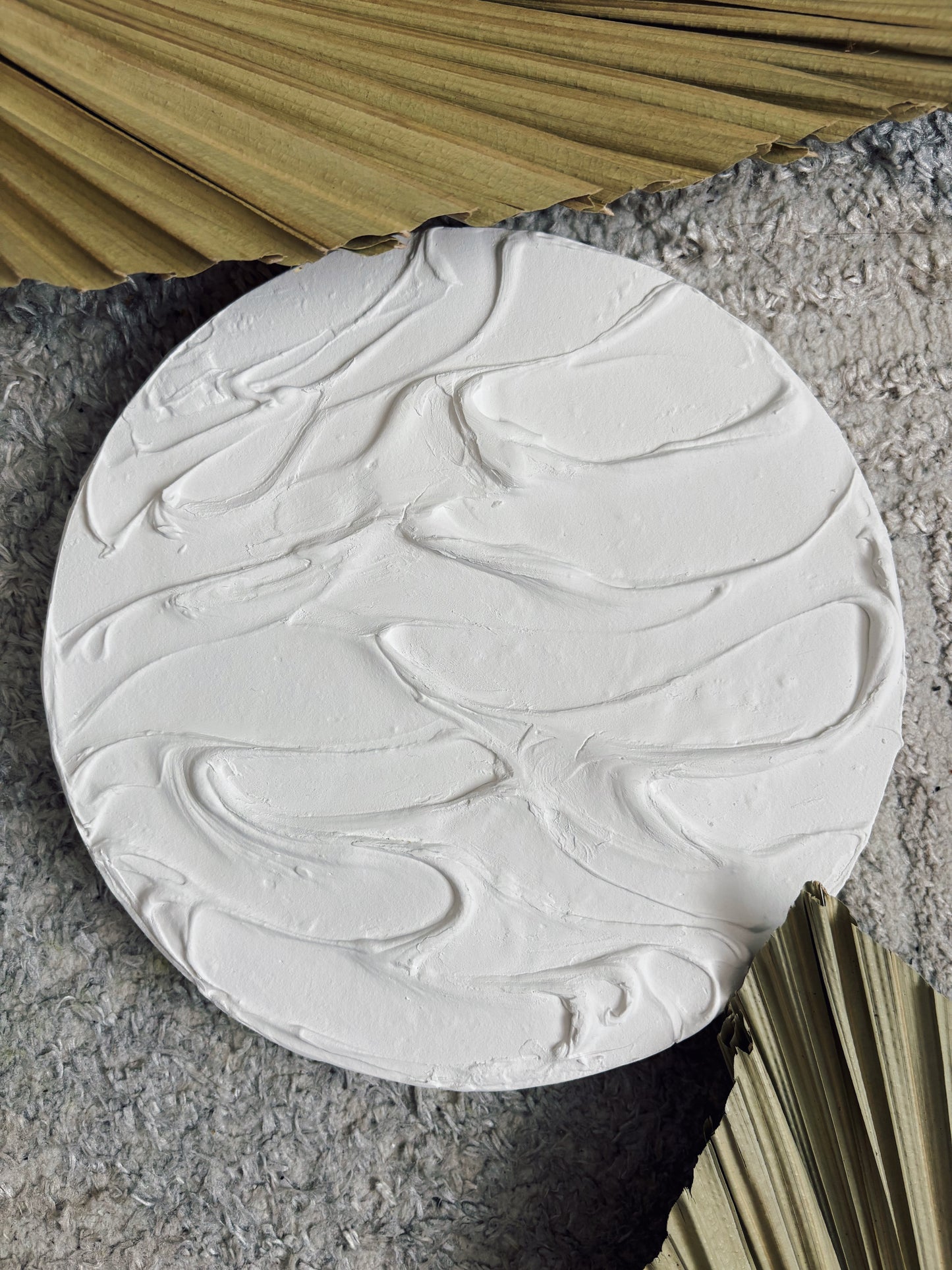 White round textured wall art
Minimalist 3D canvas artwork
Handcrafted modern wall decor
Scandinavian-inspired round art
Large white wall art piece
Contemporary circular canvas design
Neutral textured wall decor