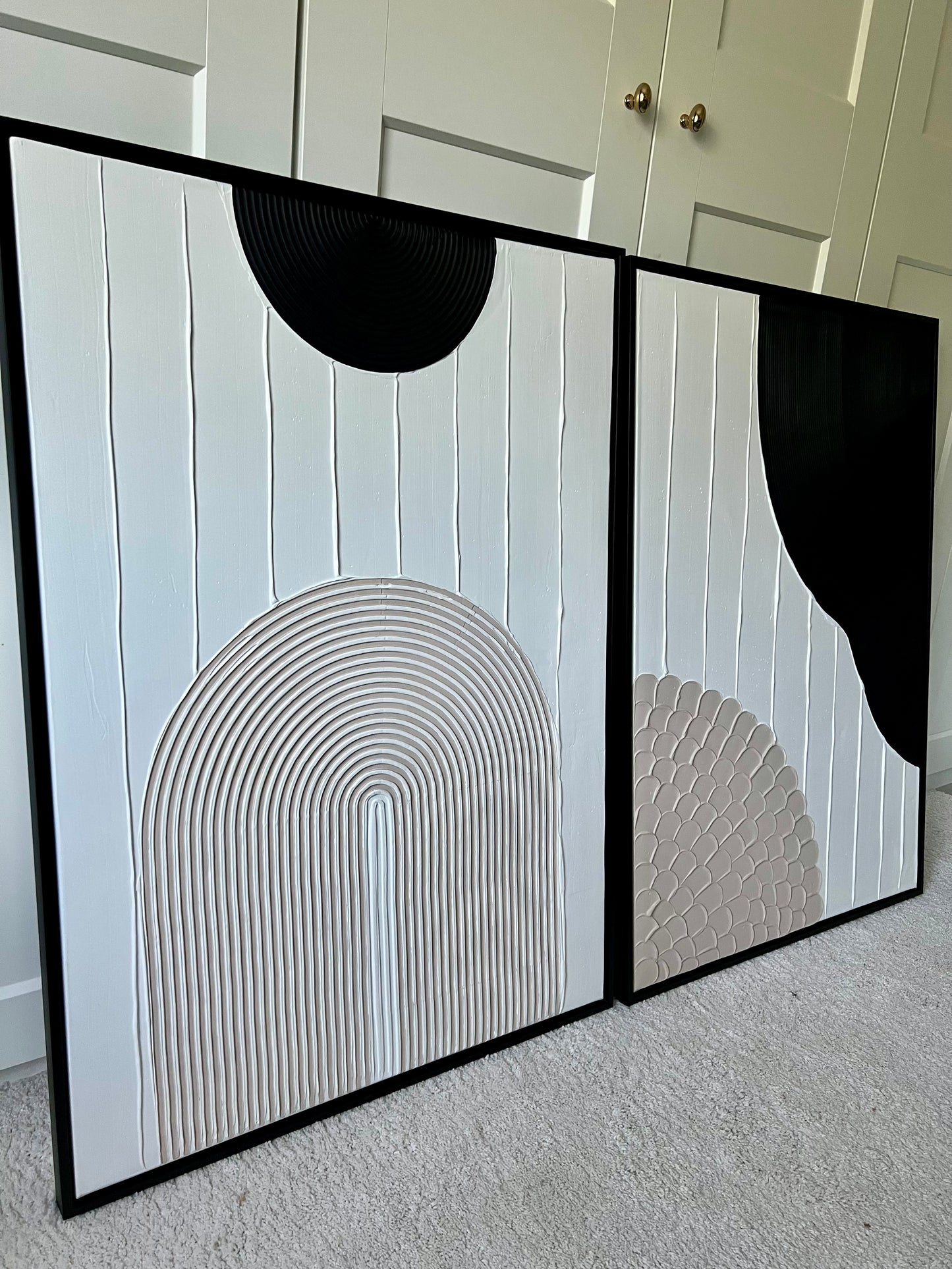 Two japandi style wall art pieces with geometric patterns on a plain background