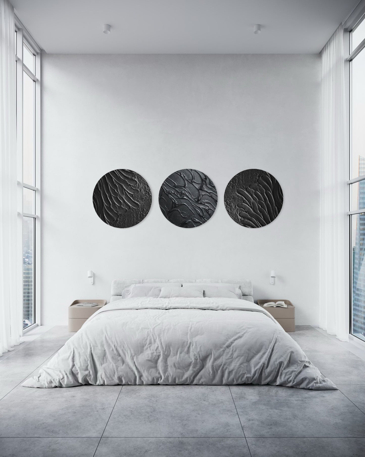 Modern bedroom with a bed and three circular wall art pieces.