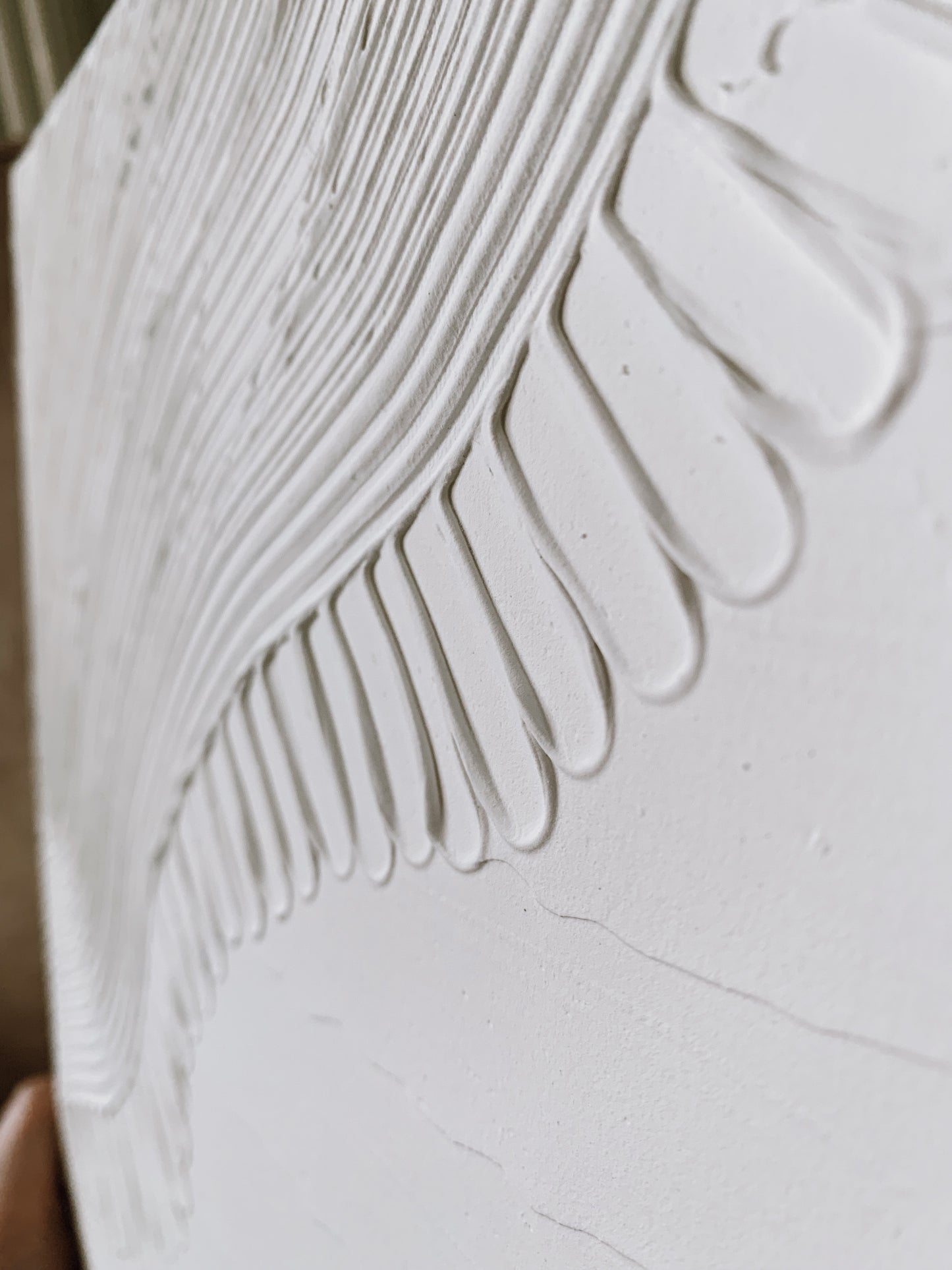 CLOSE UP of White monochrome wall art with organic form design