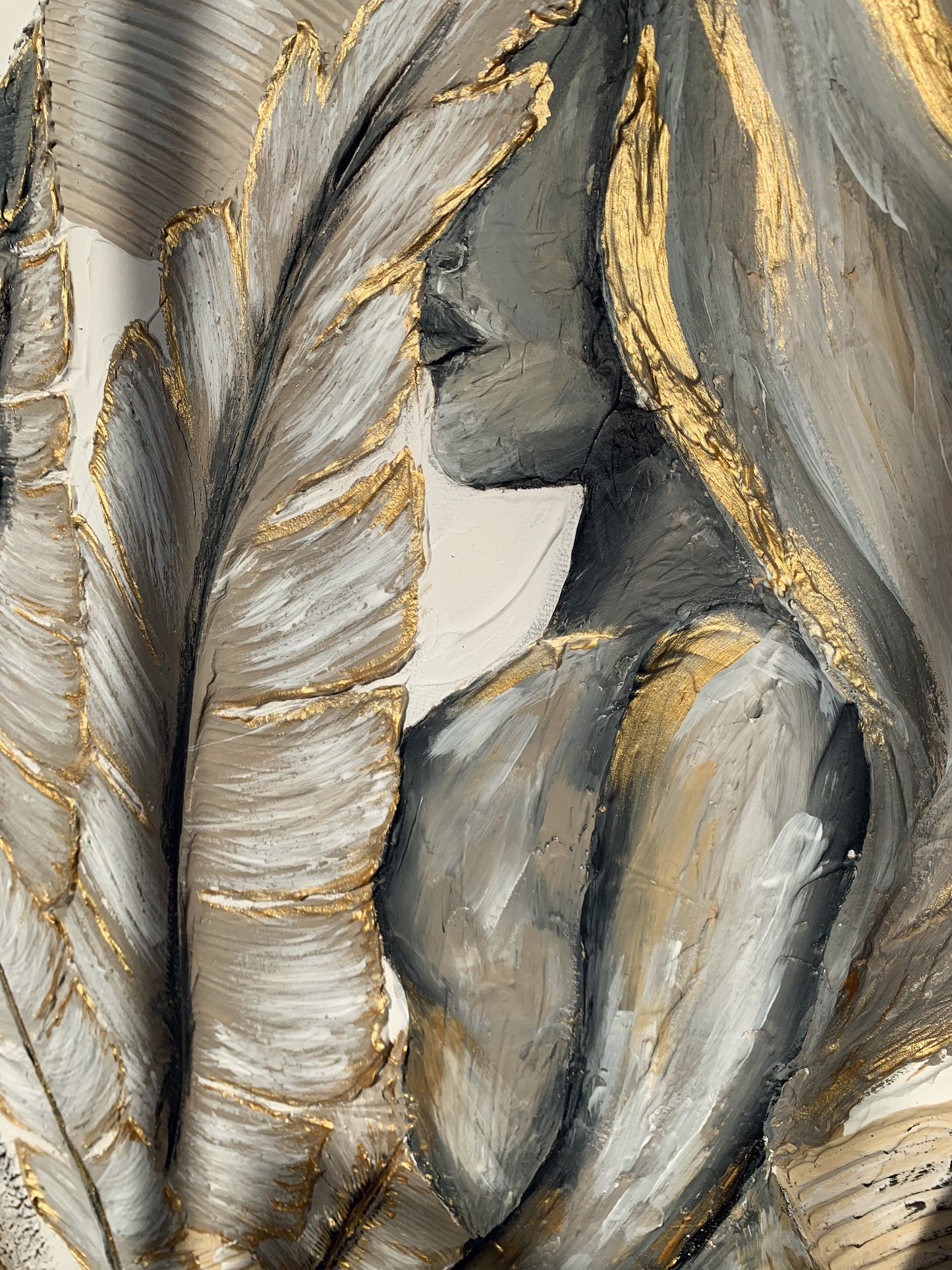 Unique female-inspired canvas art in neutral tones and gold highlights
