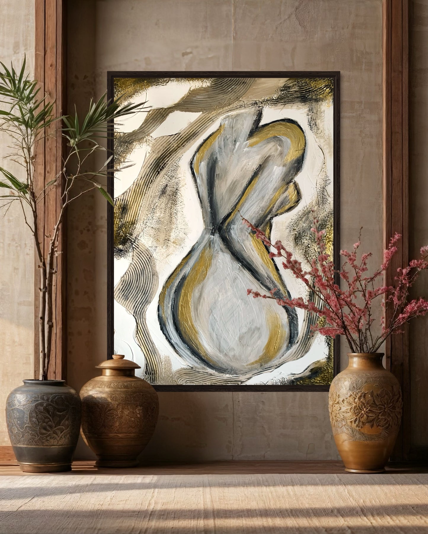 Handcrafted wall art featuring minimalist feminine form in beige and gold