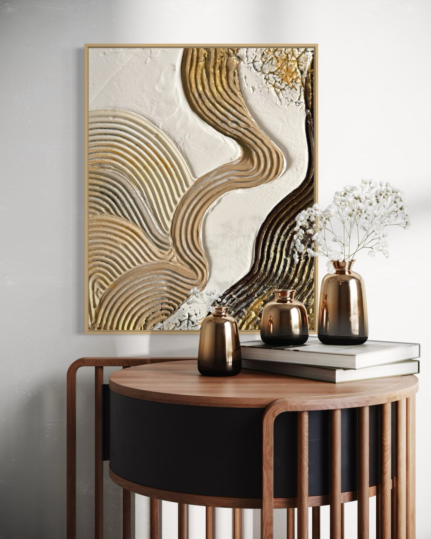 Decorative wall art in beige with wavy patterns on a white wall above a wooden side table with vases.