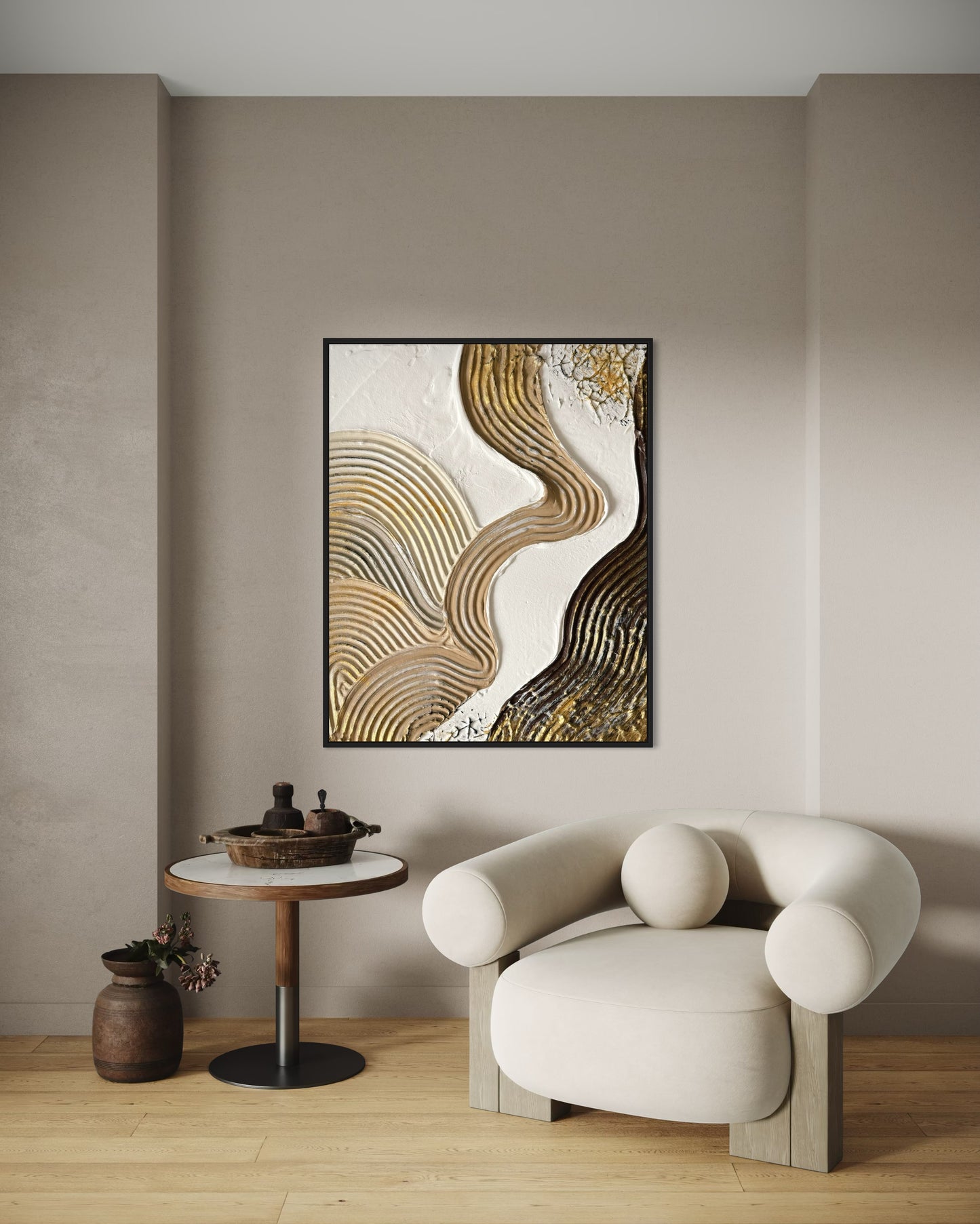 Abstract art piece on a wall above a modern chair and side table.