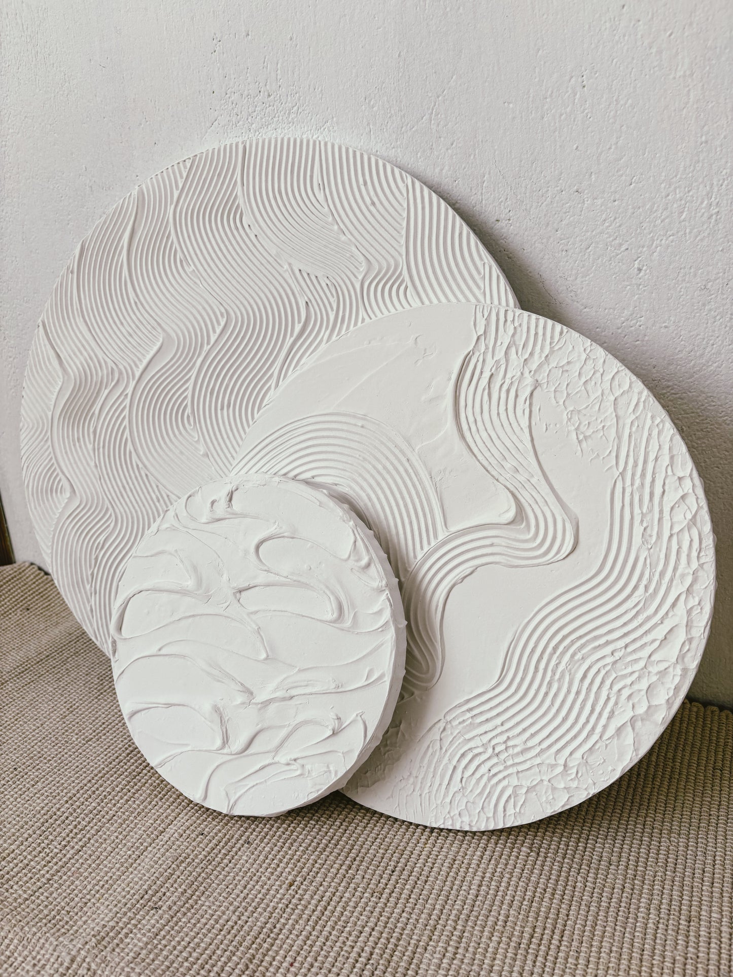 Set of 3 white round wall art
Minimalist textured canvas trio
Handcrafted 3D wall art set
Scandinavian-inspired round decor
White textured canvas paintings
Large modern round wall art set
Elegant white wall decor
Contemporary 3D round artworks