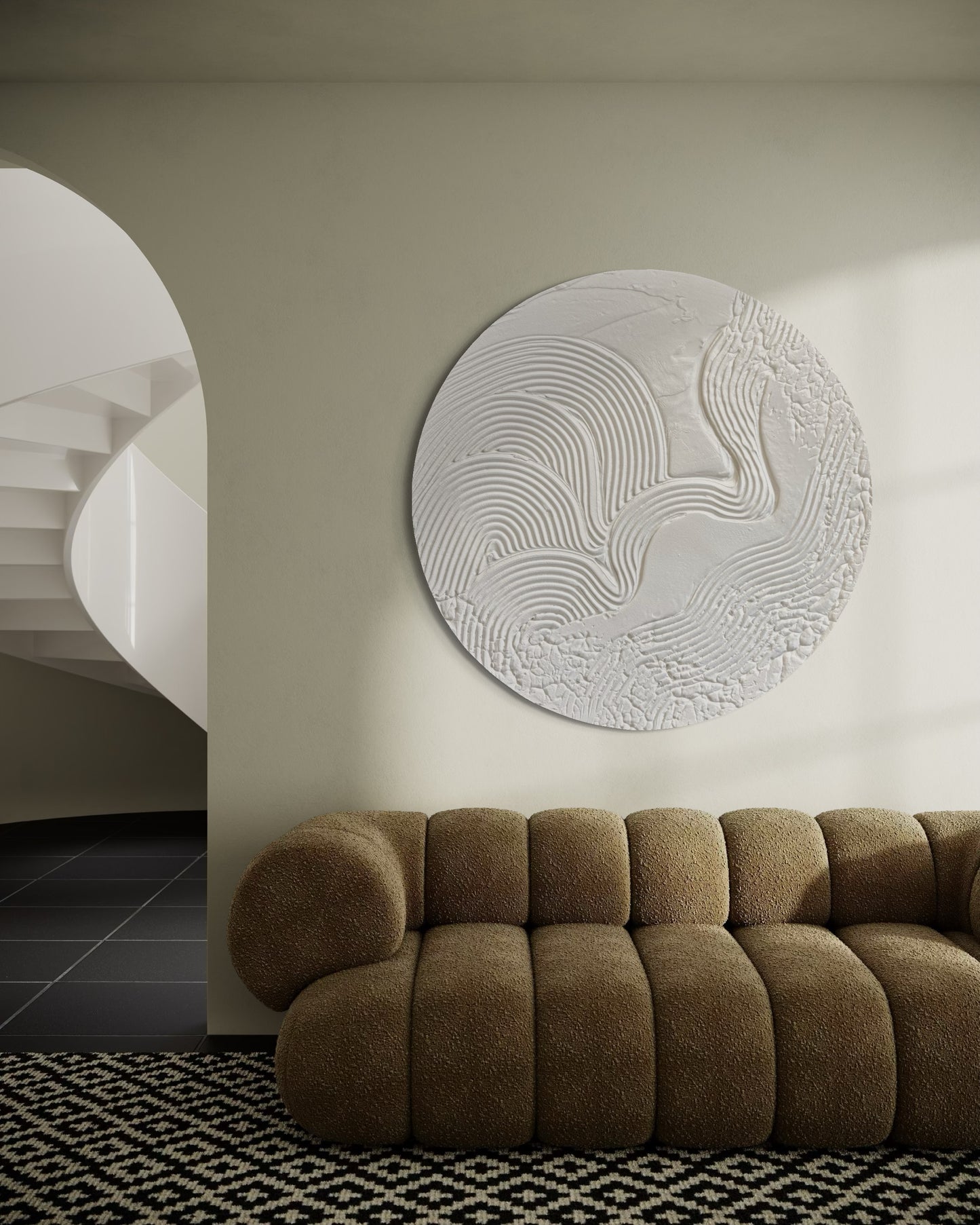 Modern, minimalist, contemporary textured wall art in white, made on round canvas.