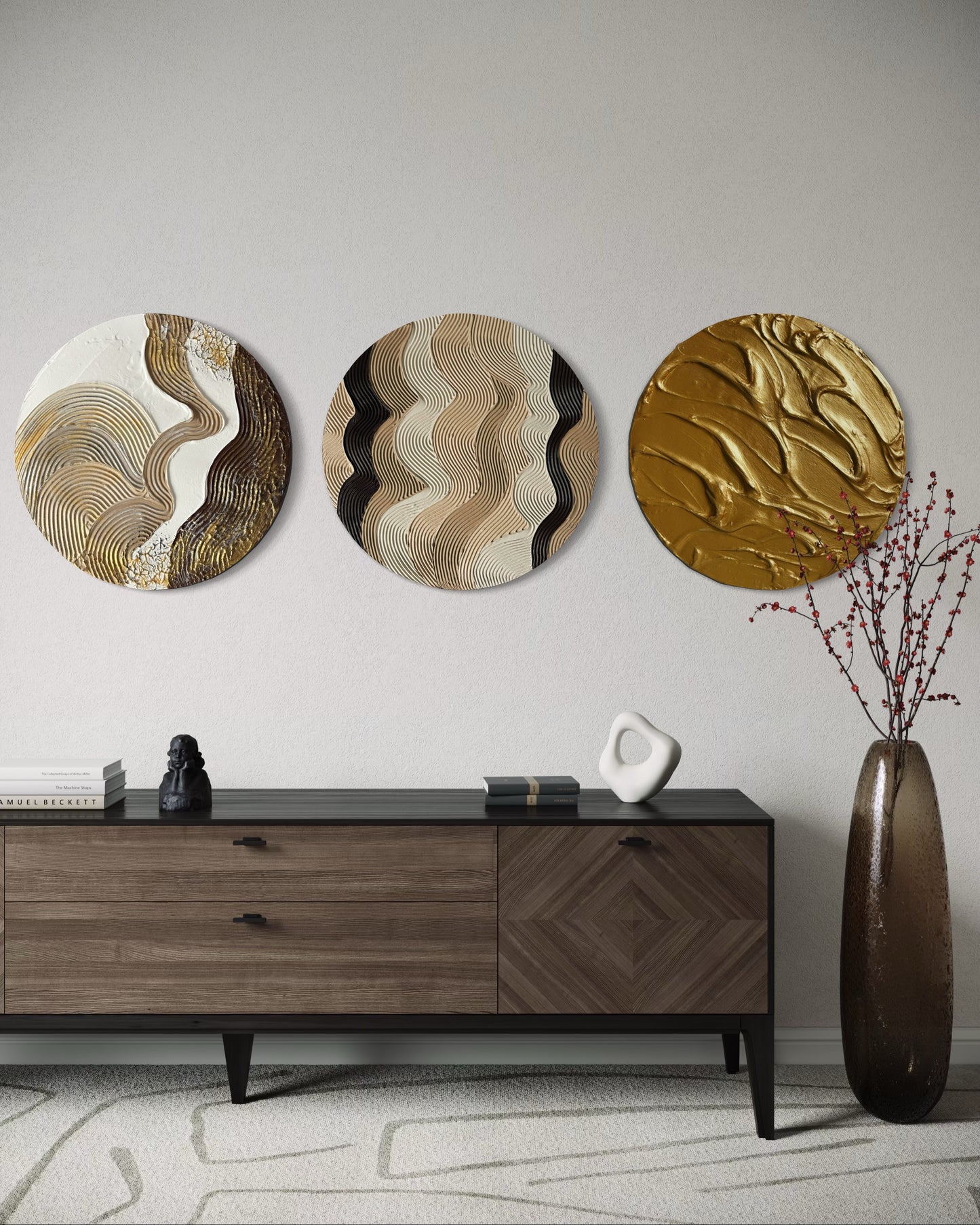 Three circular wall art pieces above a wooden console table in a room.