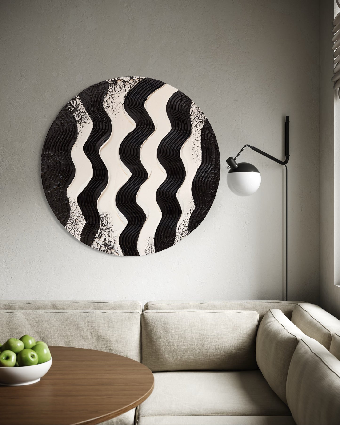 Round wall art with wavy pattern in a living room setting