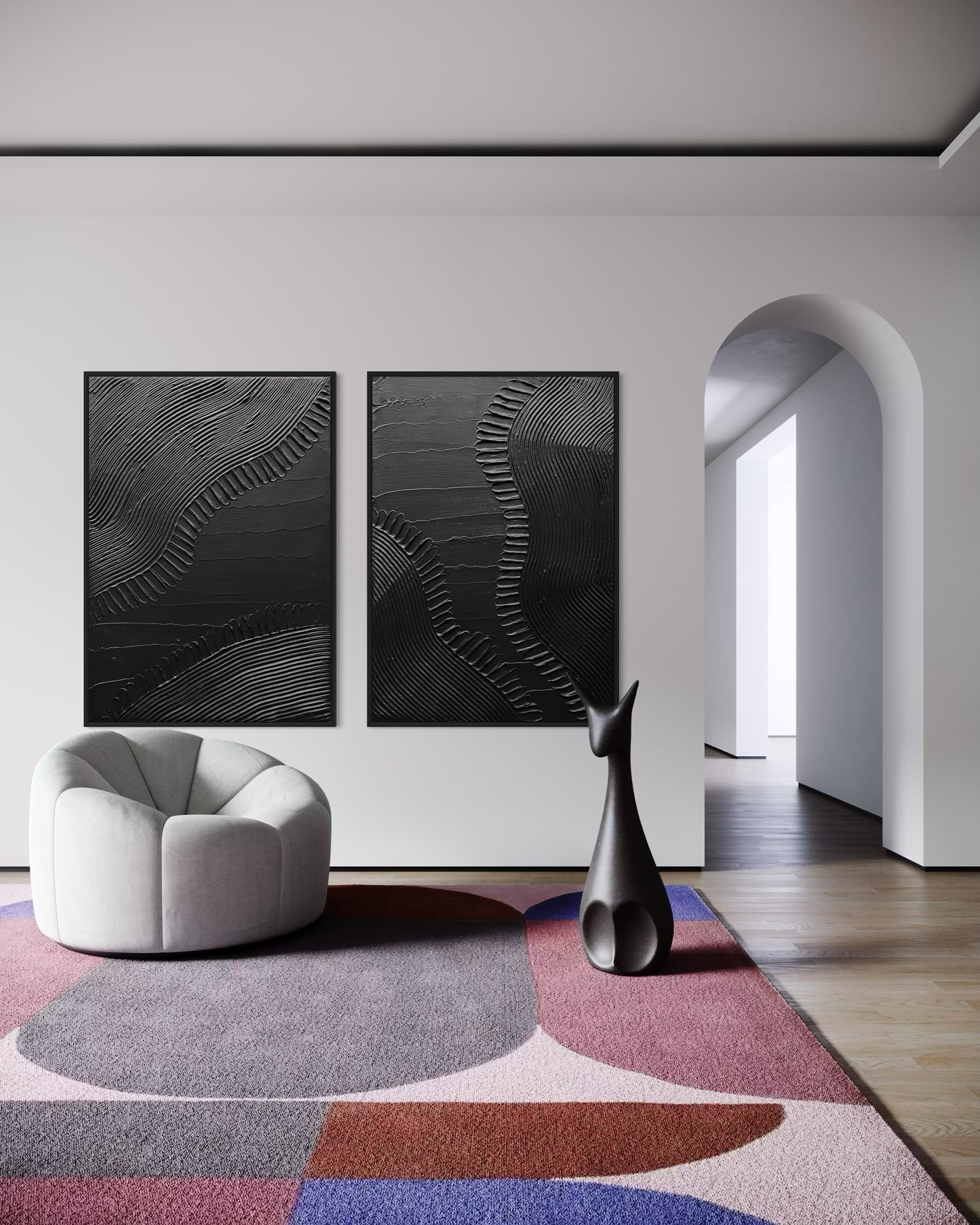 Modern interior with abstract wall art, a round white chair, and a colorful rug.