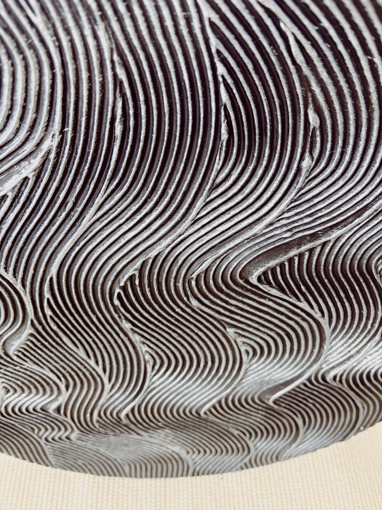 Black and silver round textured wall art
Mystical waves design abstract painting
Handcrafted 3D cosmic-inspired artwork
Modern monochrome wall decor
Circular abstract silver and black art
Statement round canvas with texture
No-frame modern wall art piece
Celestial-inspired home decor
Handmade black and silver textured painting
Elegant contemporary wall art with metallic details