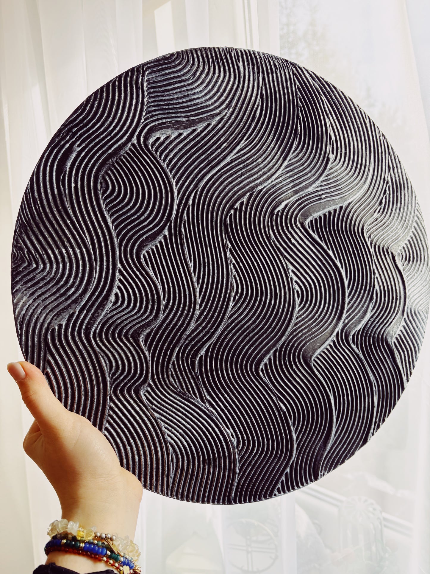 Black and silver round textured wall art
Mystical waves design abstract painting
Handcrafted 3D cosmic-inspired artwork
Modern monochrome wall decor
Circular abstract silver and black art
Statement round canvas with texture
No-frame modern wall art piece
Celestial-inspired home decor
Handmade black and silver textured painting
Elegant contemporary wall art with metallic details