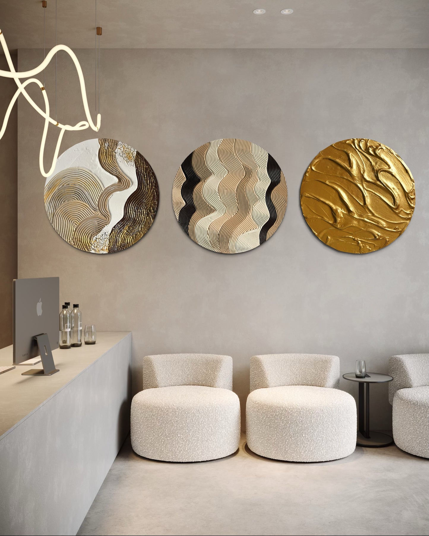 Modern interior with round set of 3 abstract wall art and white chairs.