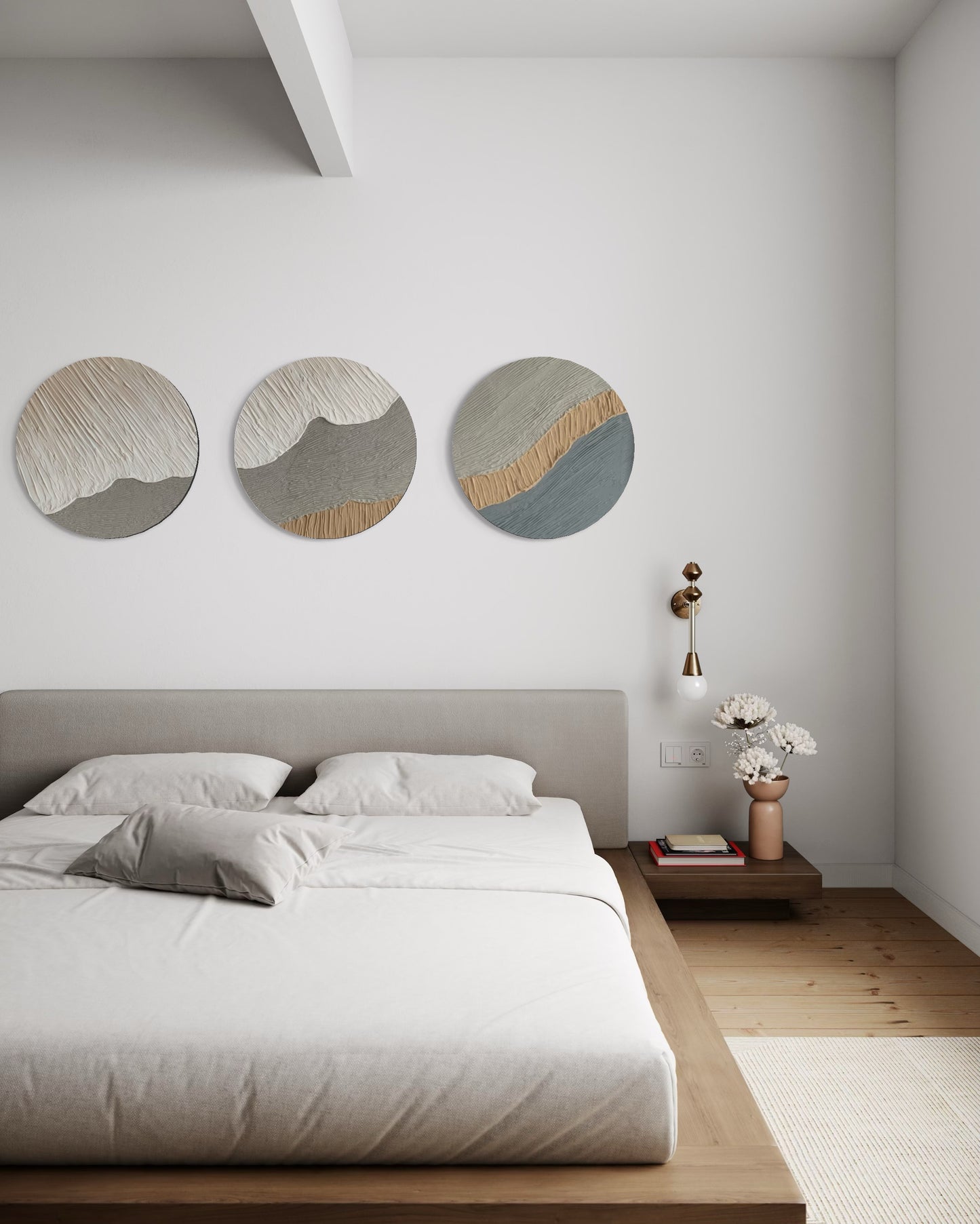 Modern bedroom with a bed, nightstand, and set of 3 textured wall art