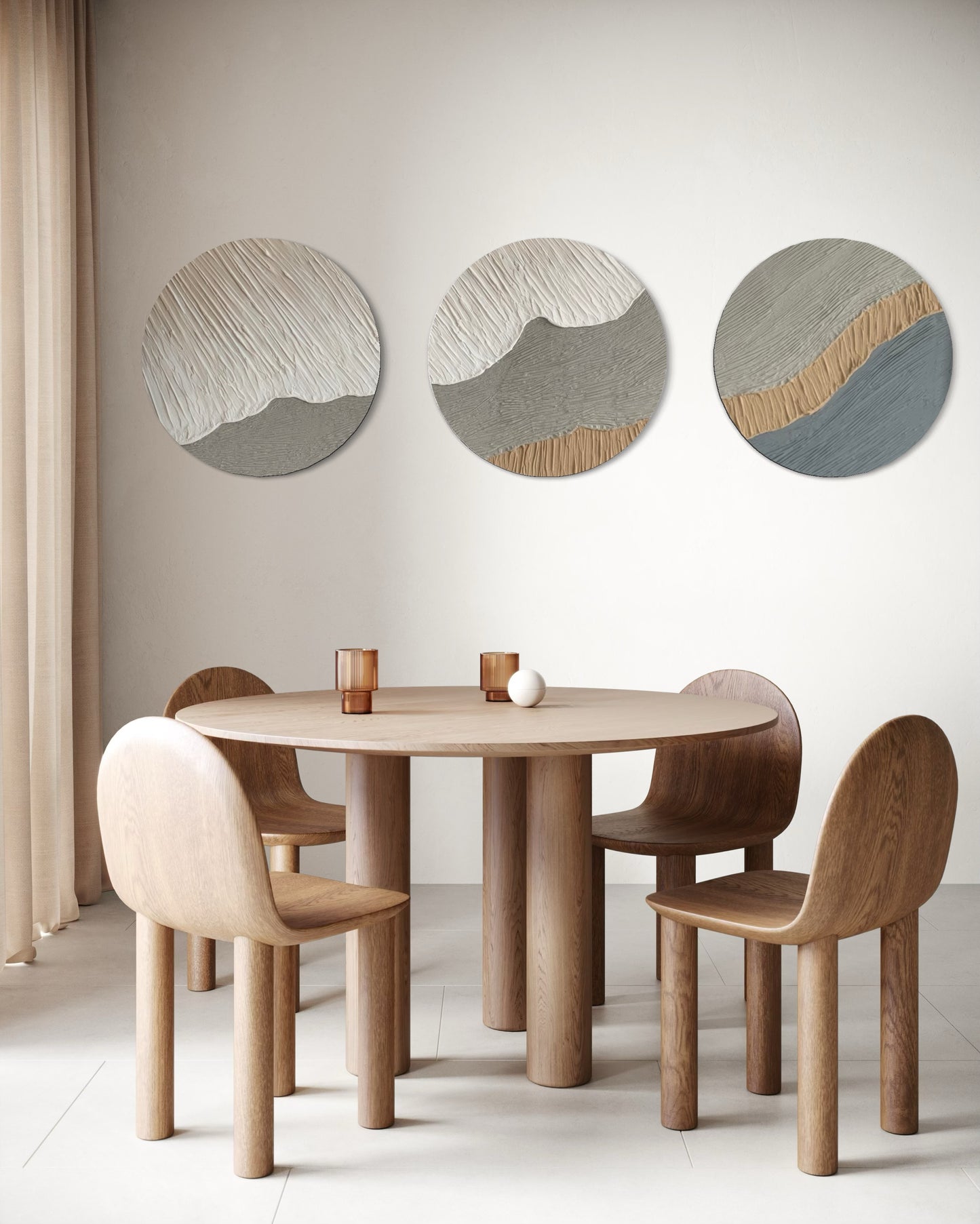 Dining area with a round wooden table and chairs, featuring abstract wall art set of 3 round textured wall art