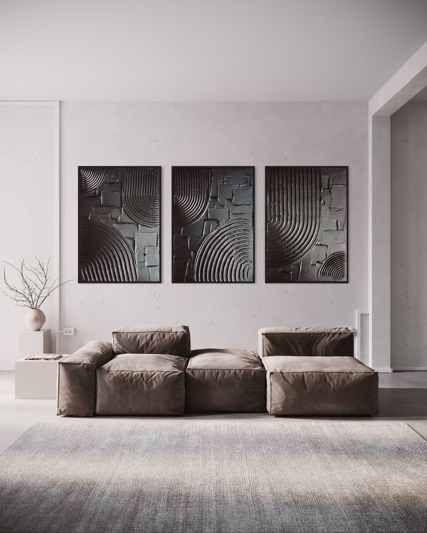 Modern living room with a brown sectional sofa and abstract wall art.