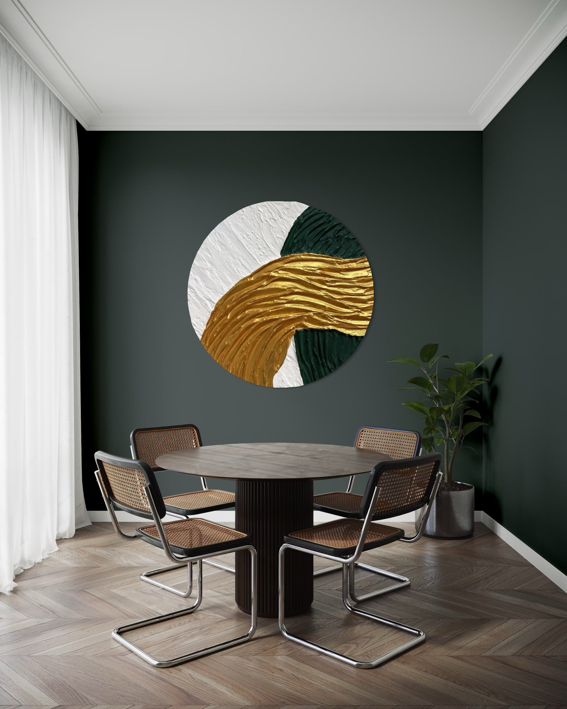 Modern dining room with a round table and chairs against a dark wall with a circular abstract art piece.
