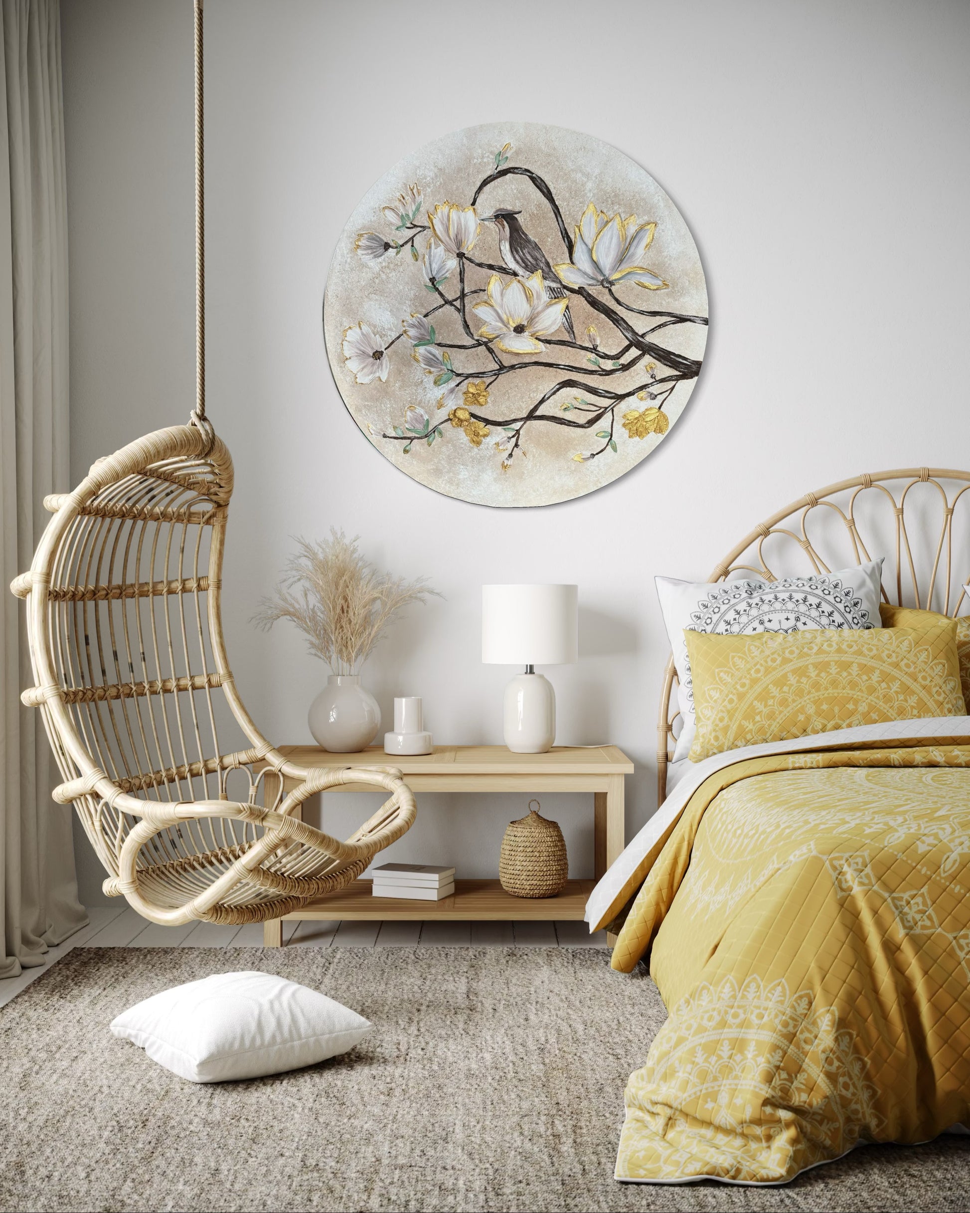 Cozy bedroom with hanging rattan chair, round wall art with cherry blossom and bird in beige and yellow bedding.