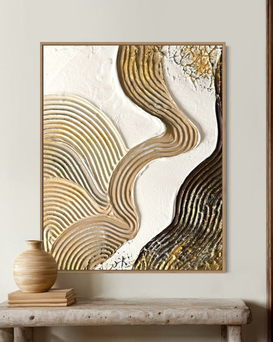 Abstract wall art with wavy patterns on a neutral background, displayed above a stone table with vases and stools.