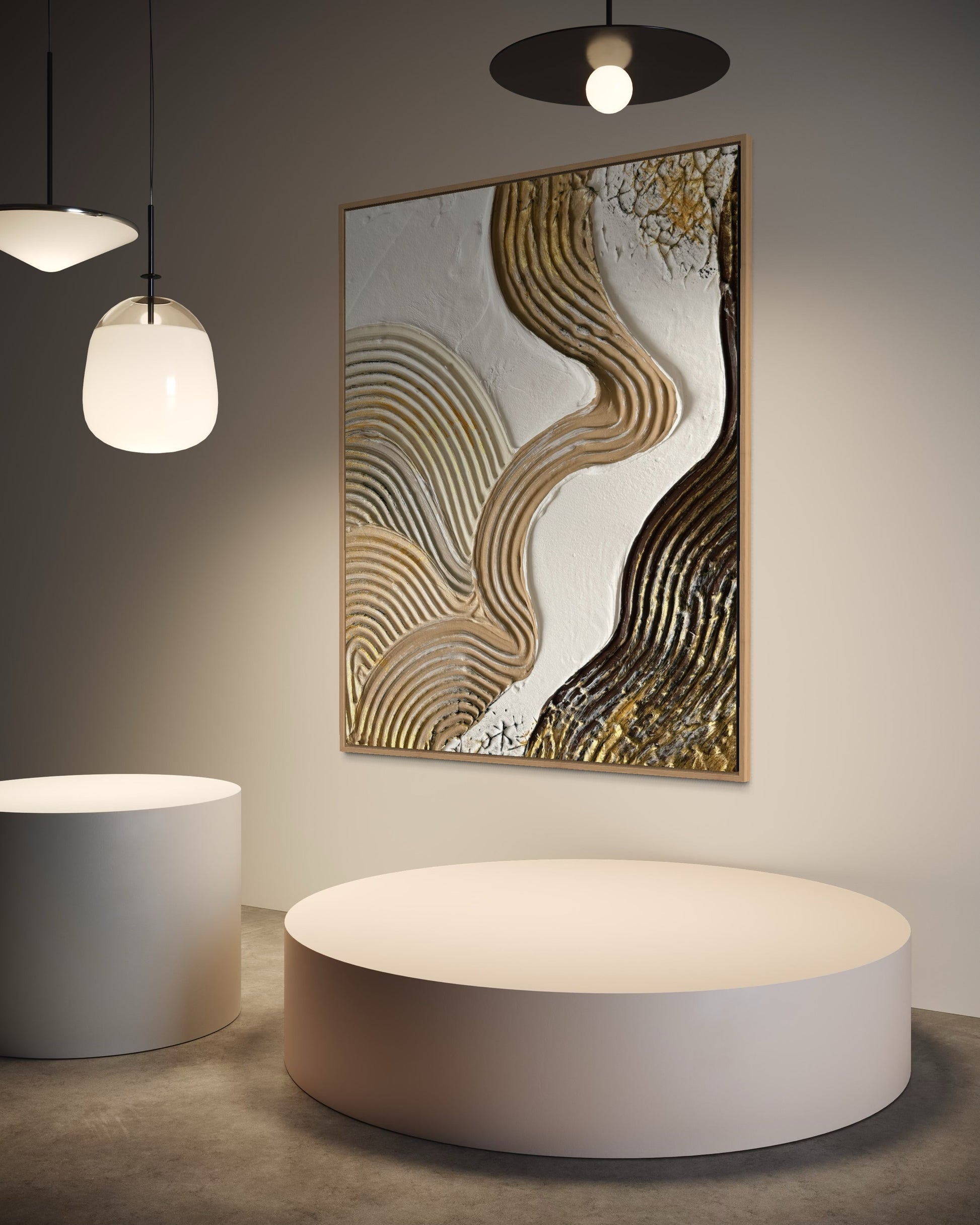 Abstract textured wall art piece in a modern interior setting with round white tables and pendant lights.