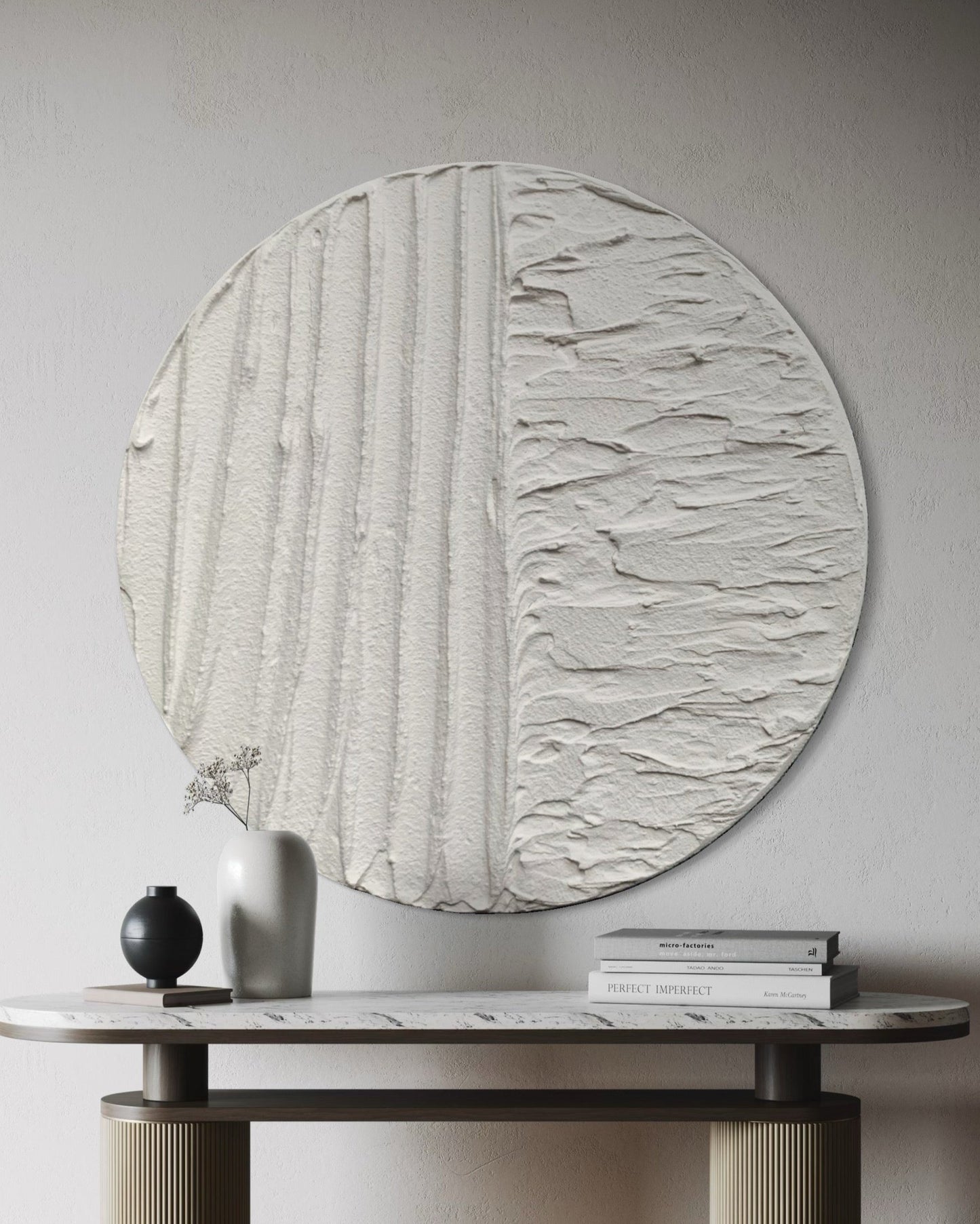 Modern, minimalist, contemporary textured wall art in white, made on round canvas.