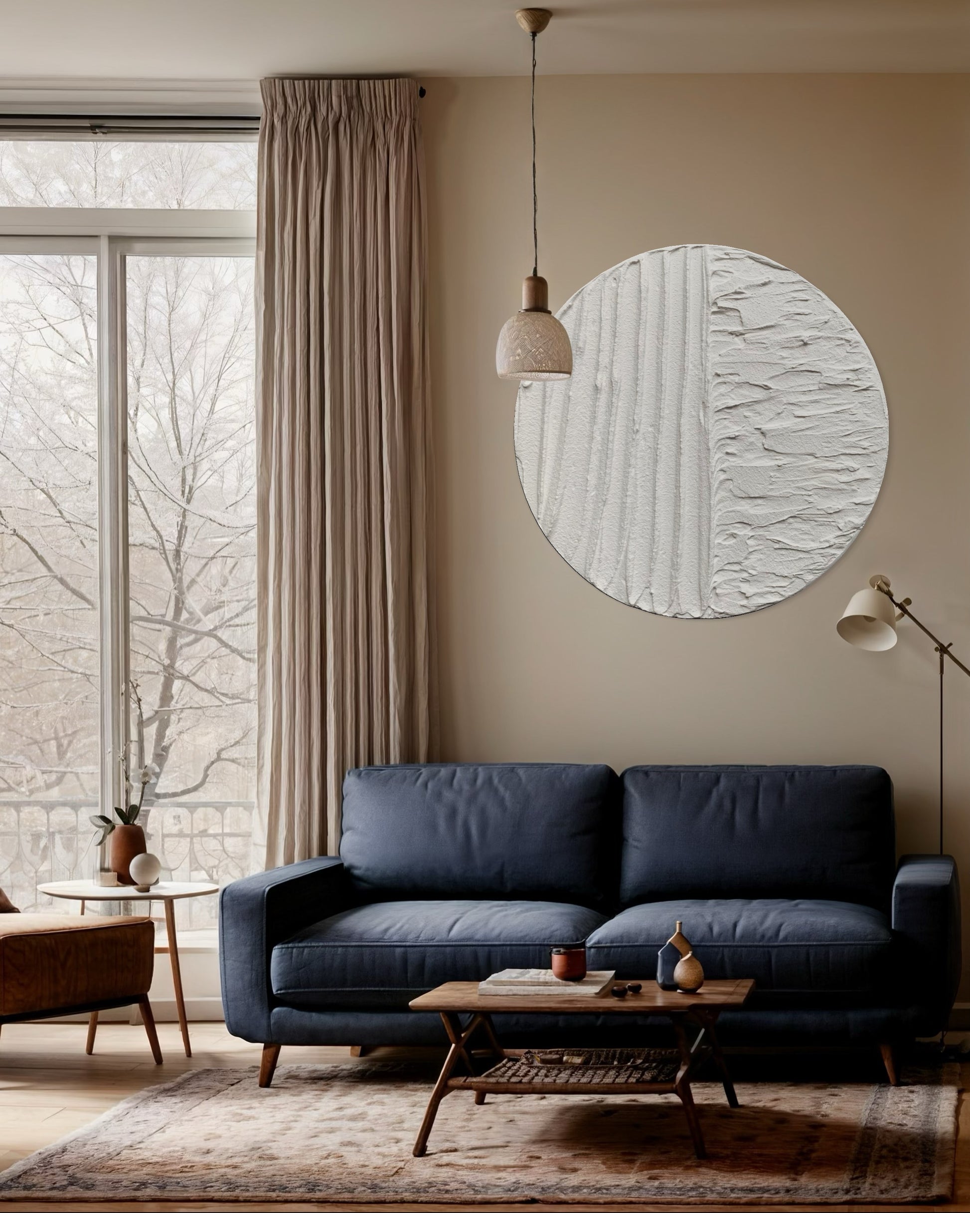 Modern, minimalist, contemporary textured wall art in white, made on round canvas.