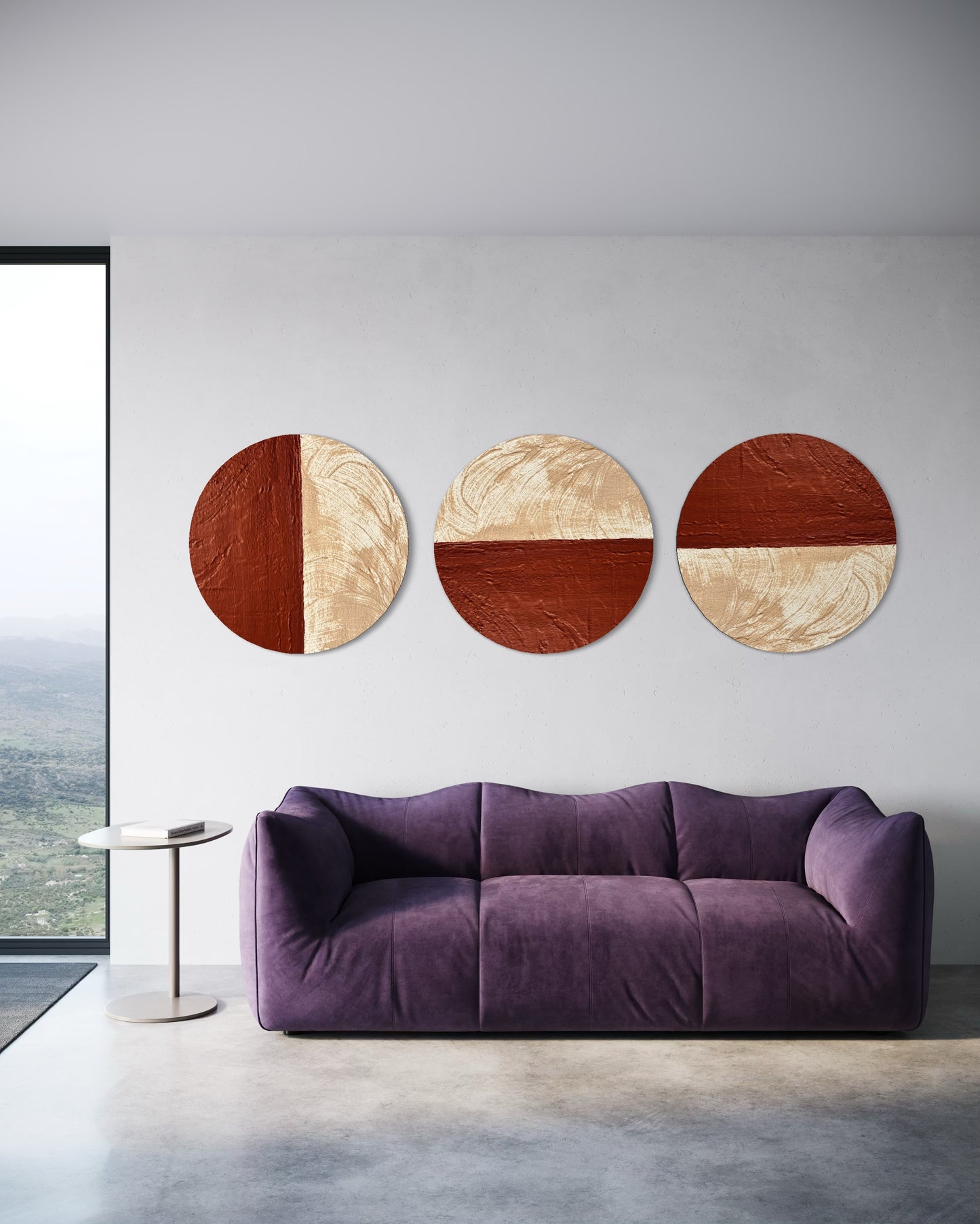 Purple sofa in a modern living room with three circular wall art pieces.
