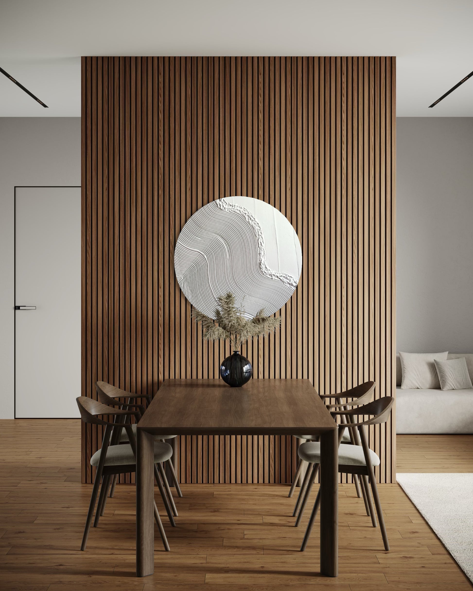 Modern dining room with wooden table and chairs against a slatted wood wall.