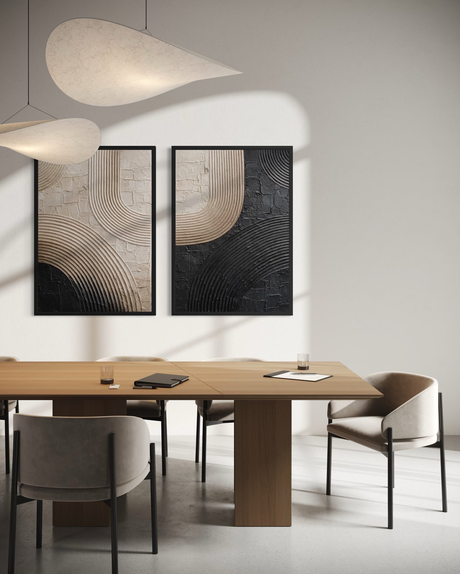 Modern dining room with wooden table, chairs, and abstract wall art.