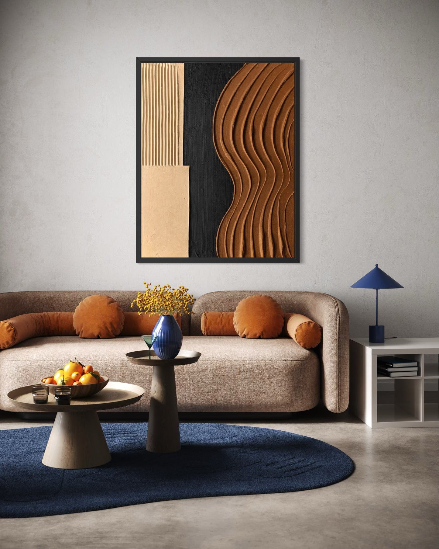 Modern living room with a sofa, coffee table, and abstract wall art.