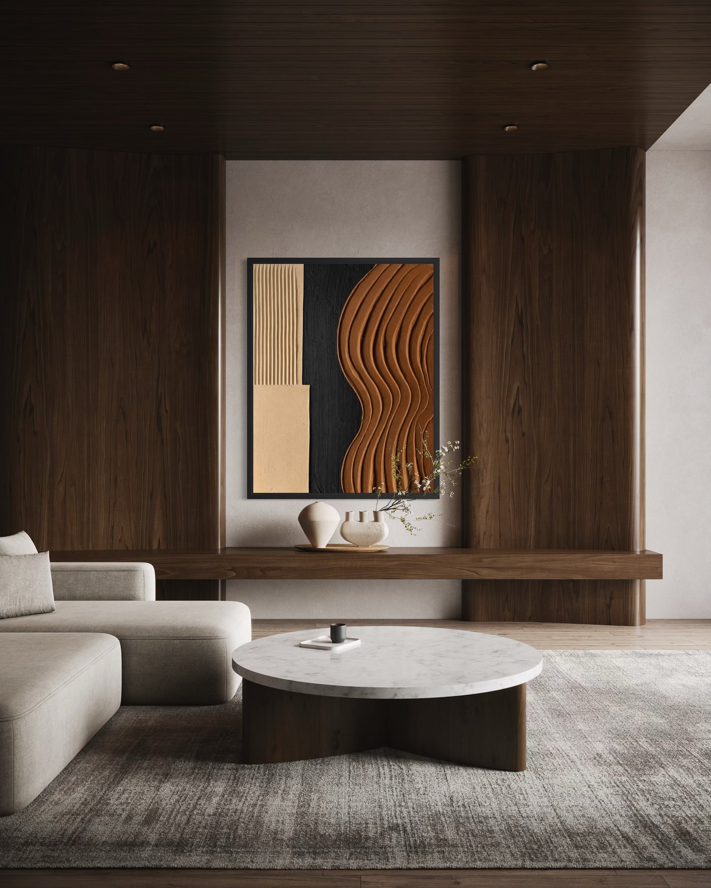 Modern living room with a abstract wall art piece, gray sofa, and marble coffee table.