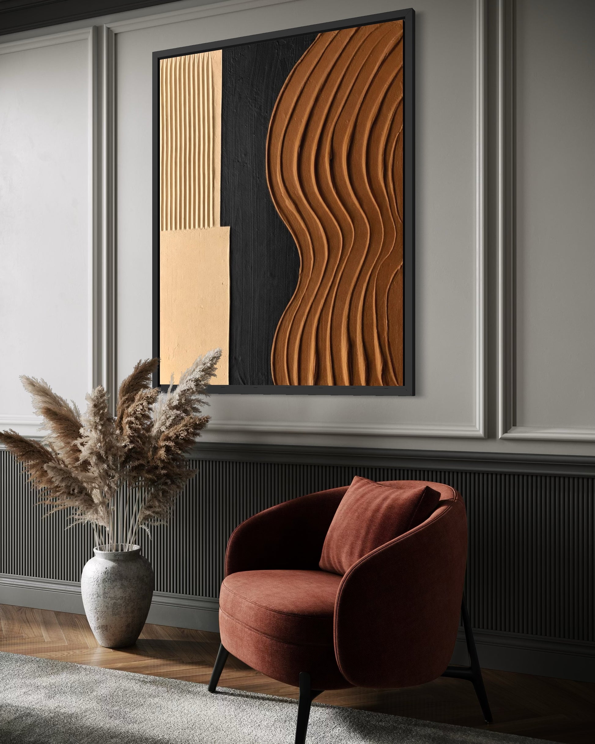 Modern interior with a textured wall art piece, red armchair, and decorative plant.