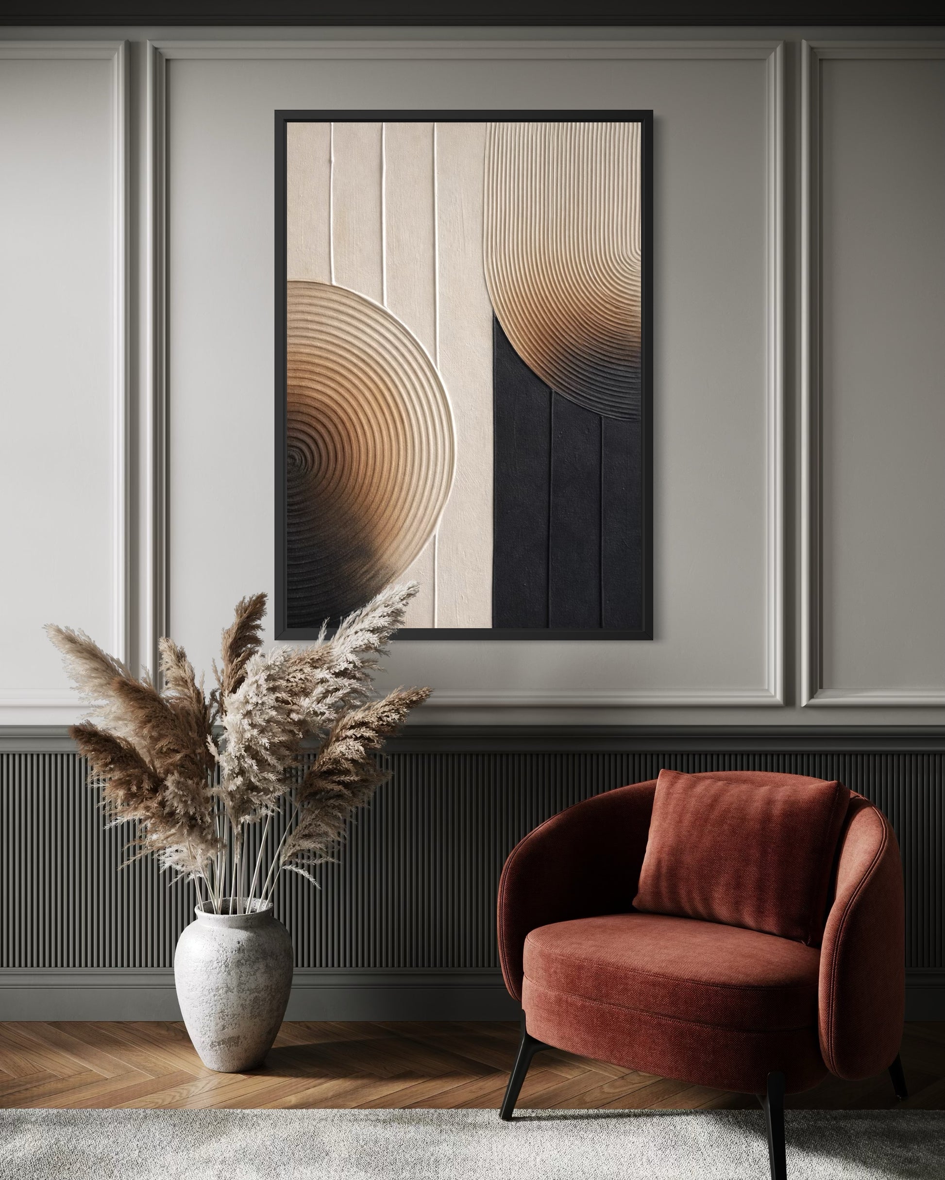 Modern interior with a red armchair, decorative vase with pampas grass, and abstract wall art.