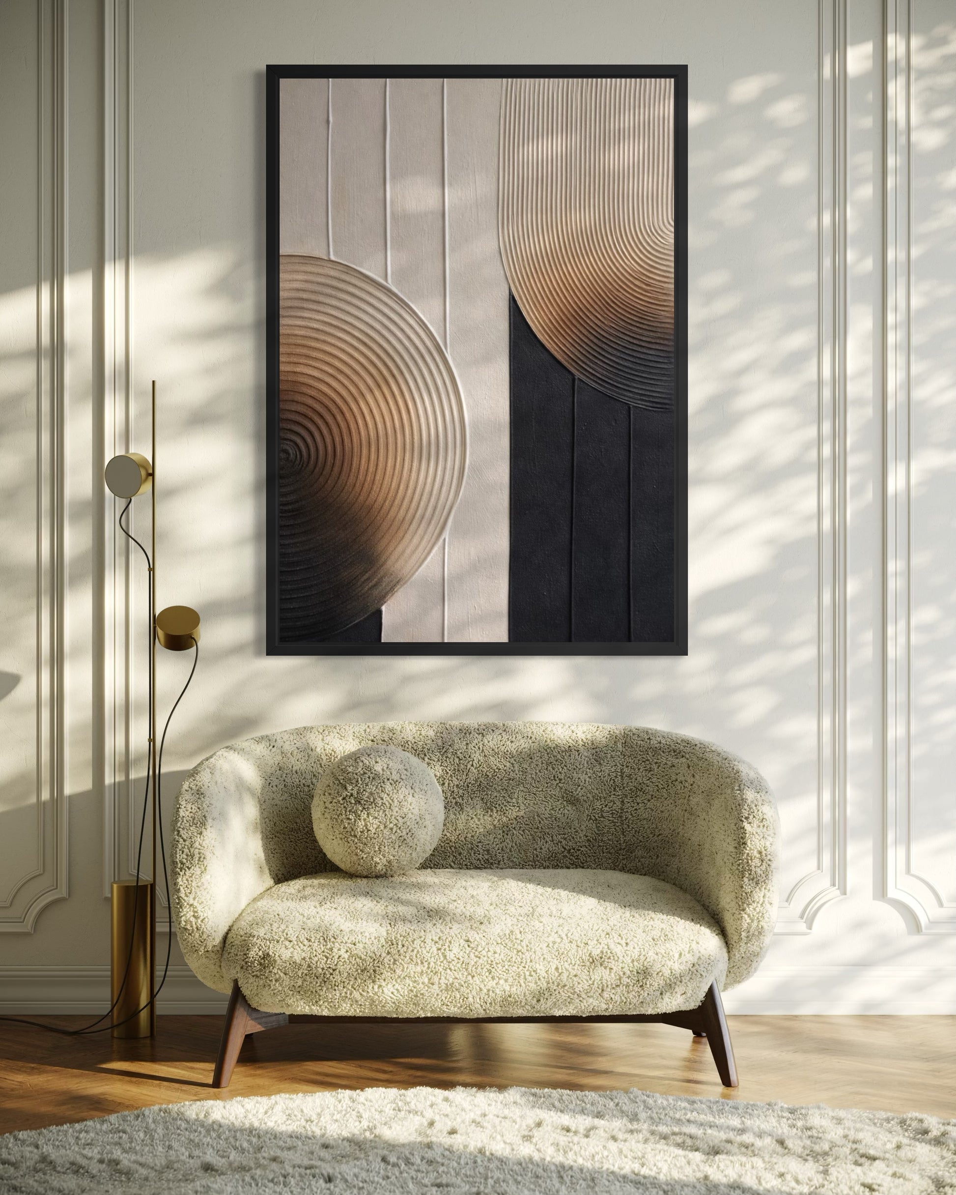 Modern living room with a patterned sofa, floor lamp, and abstract wall art.