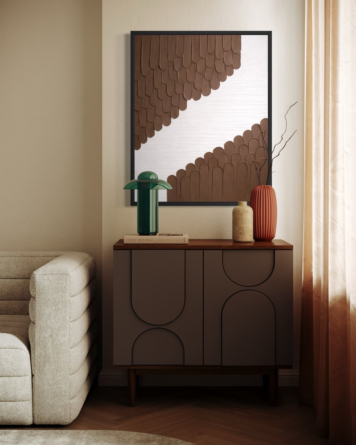 Modern interior with a sideboard, decorative mirror, and vases.