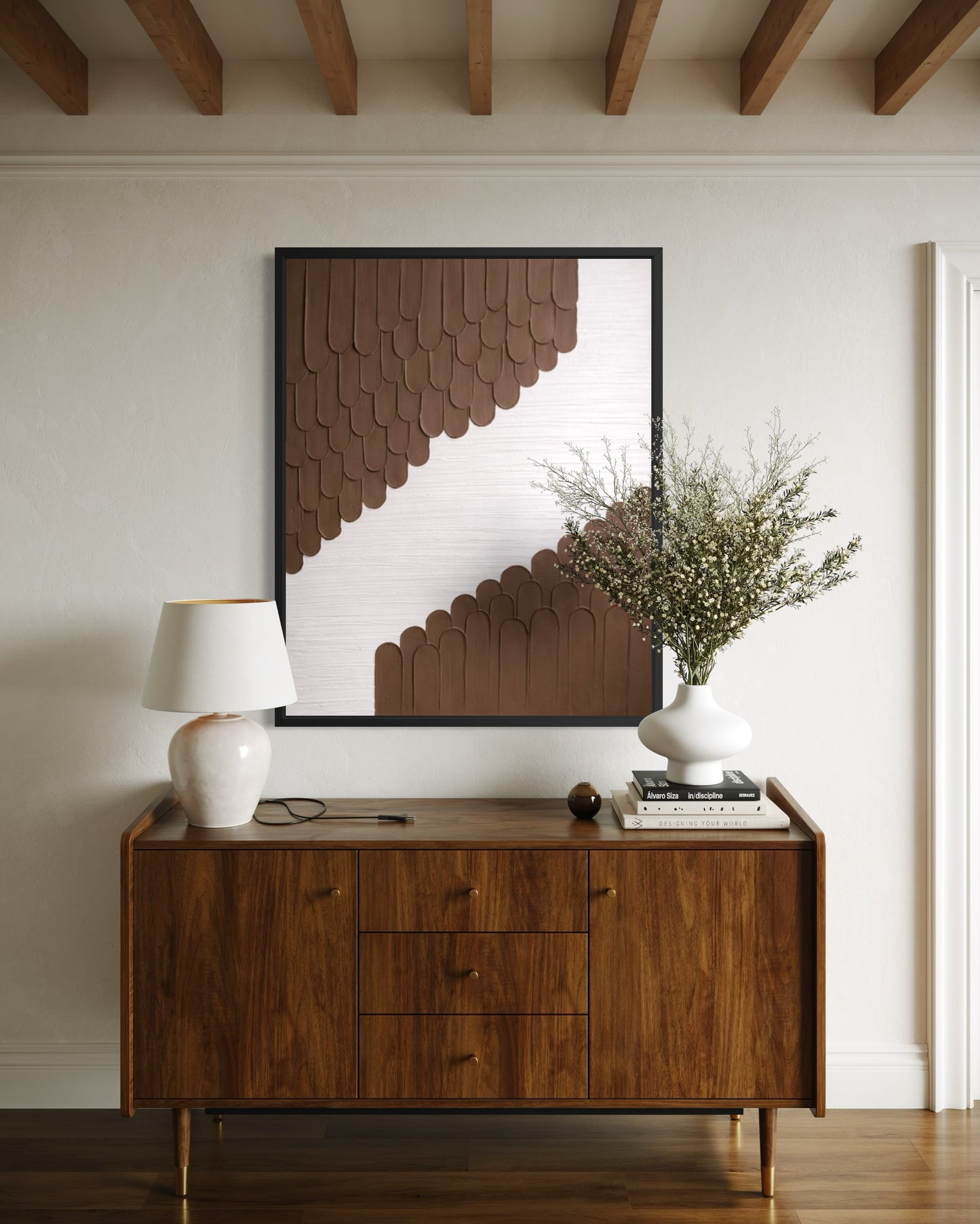Wooden sideboard with decorative items in a room with wooden beams.