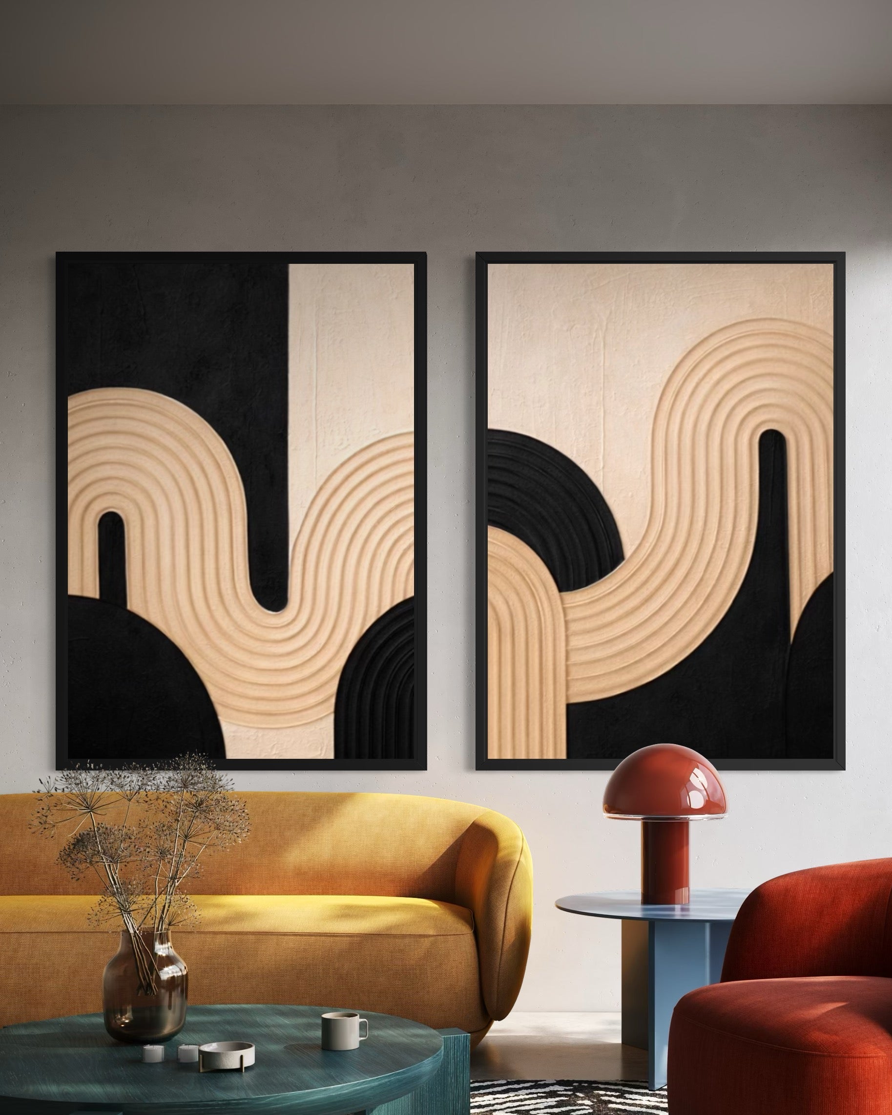 Modern living room with abstract wall art, orange sofa, and red armchair.
