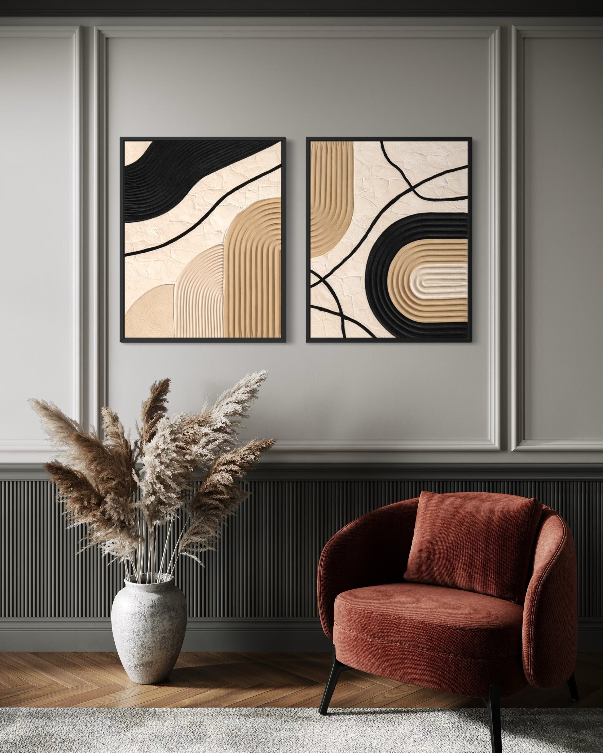 Modern interior with abstract wall art, a red armchair, and decorative vase.