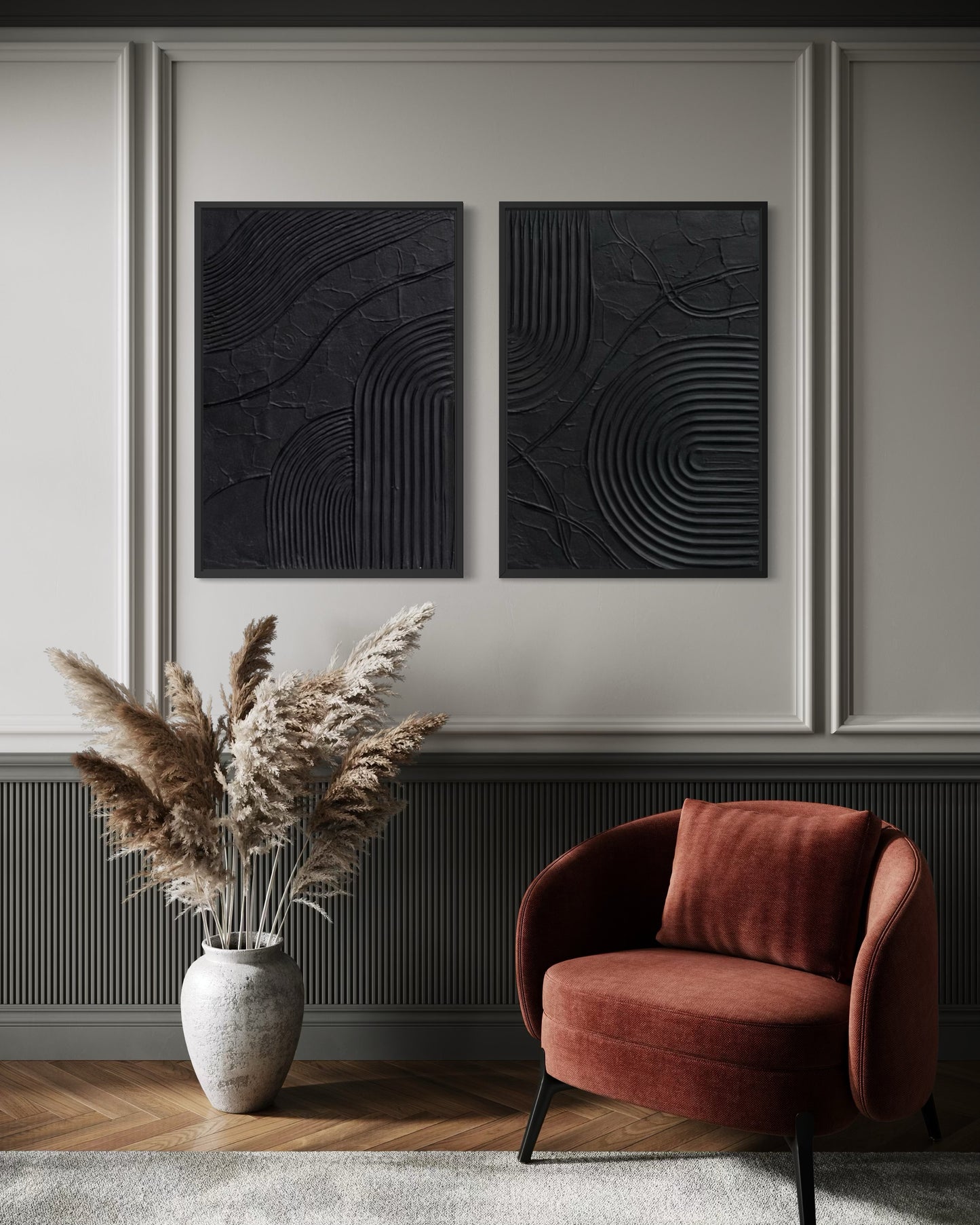 Modern interior with a red armchair, decorative vase with pampas grass, and abstract wall art.