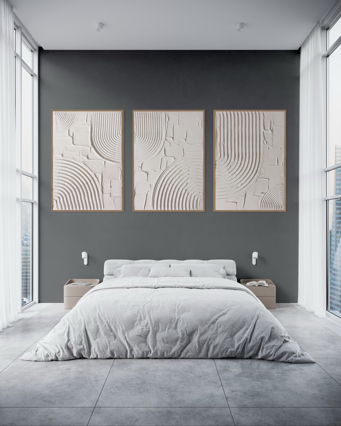 Modern bedroom with gray walls, a bed, and abstract wall art.