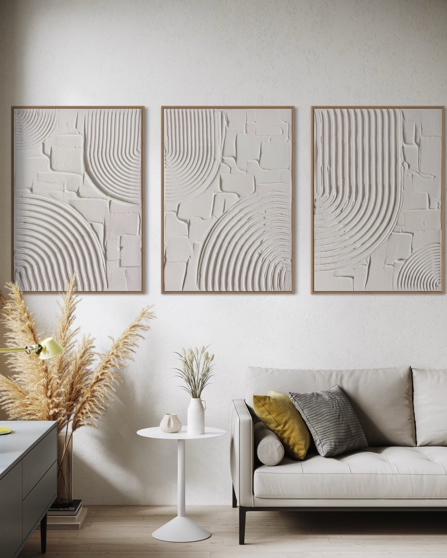 Modern living room with abstract wall art, a sofa, and decorative elements.