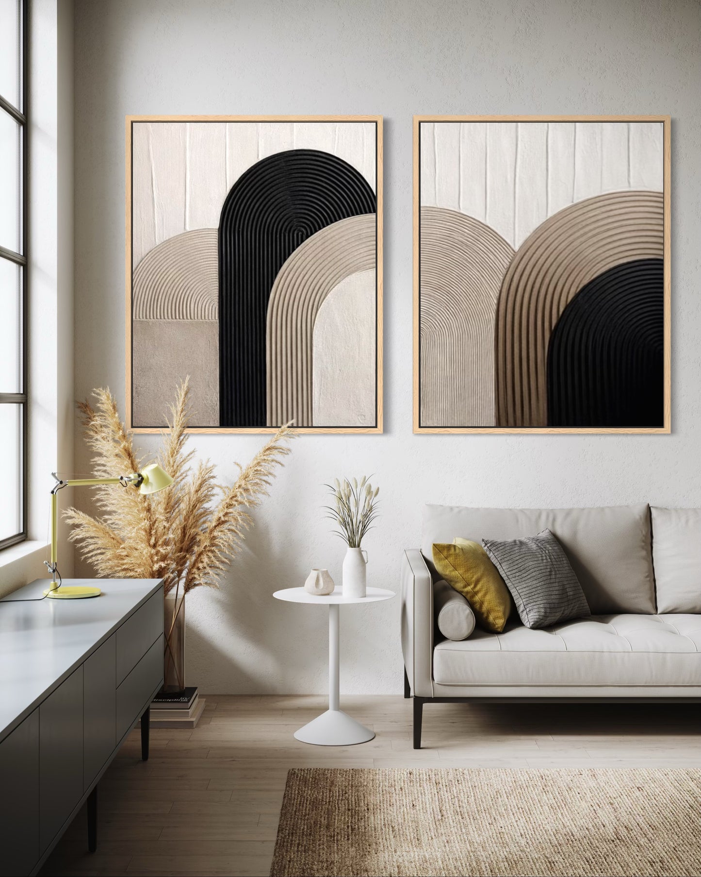 Modern living room with abstract wall art, a sofa, and decorative elements.