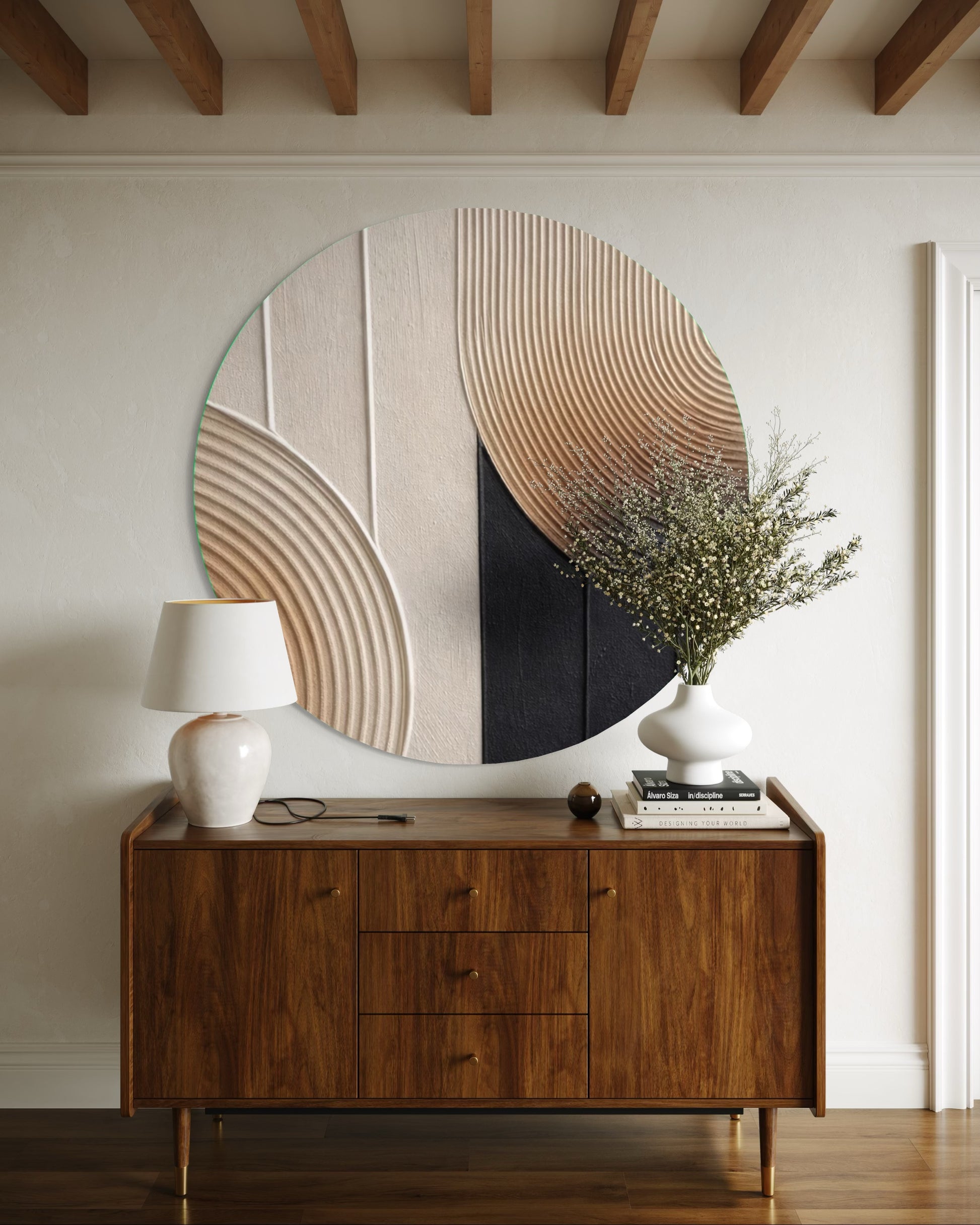 Wooden sideboard with decorative mirror and lamp in a room with wooden beams.