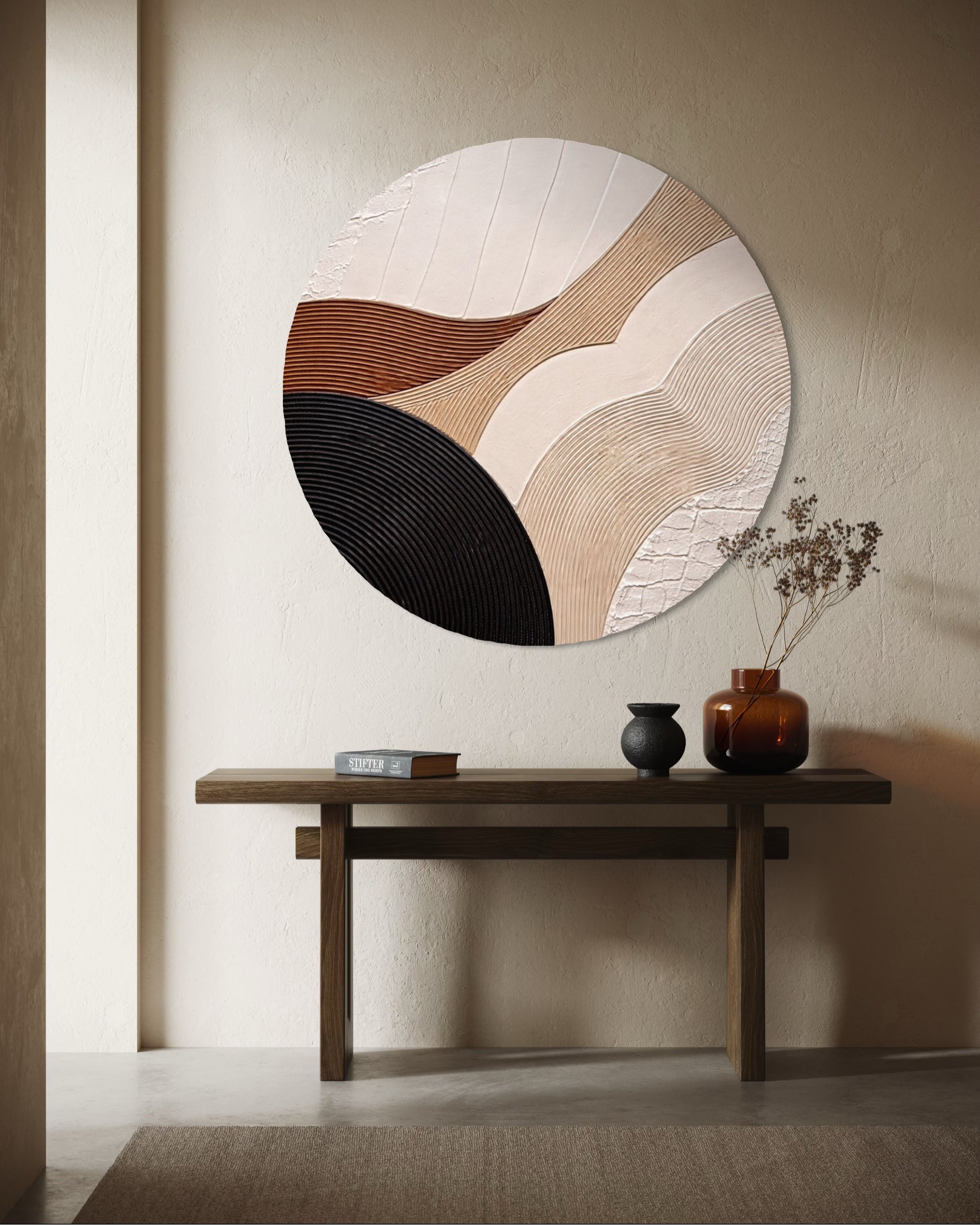 Decorative wall art with circular design in a minimalistic room.
