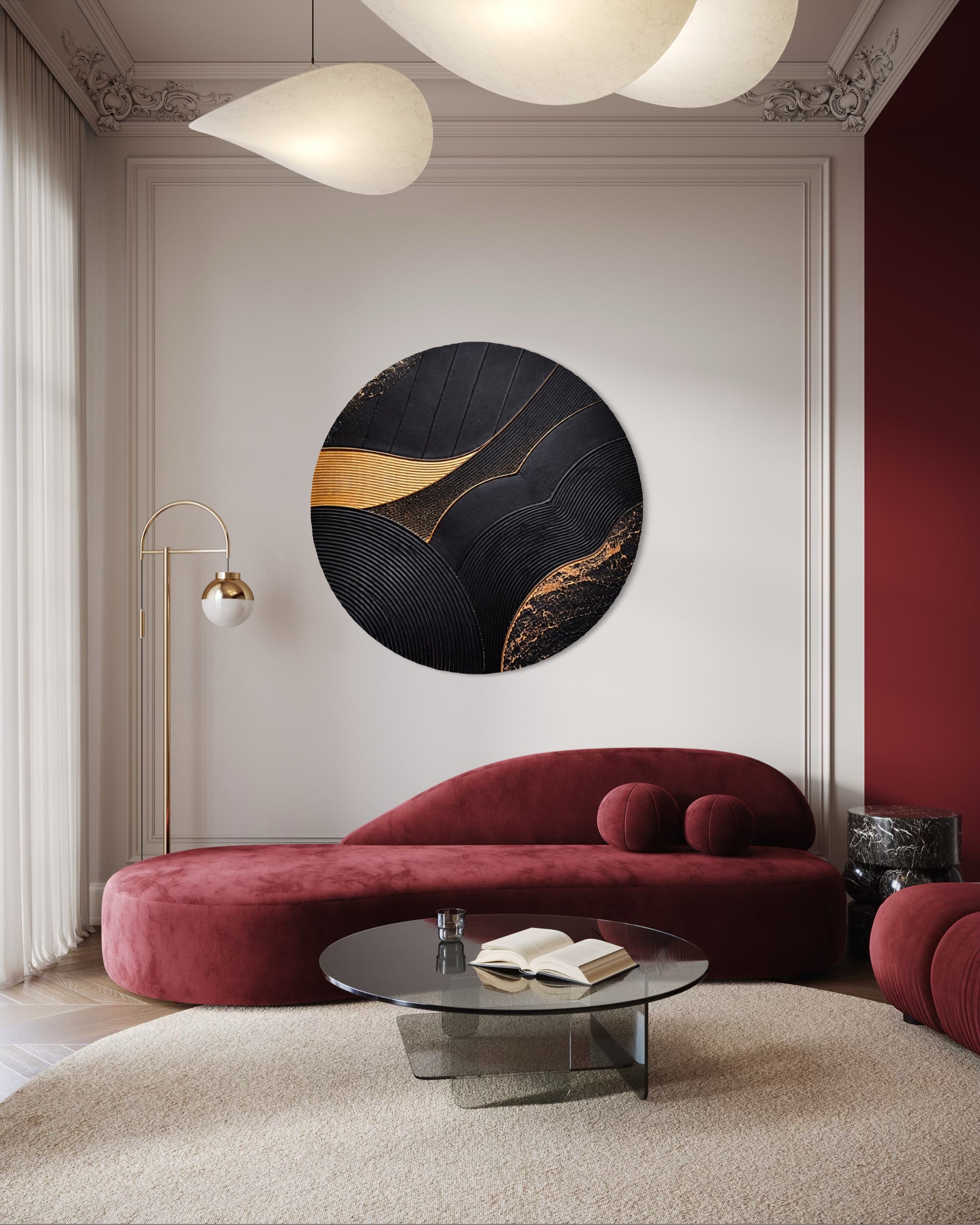Modern living room with a red sofa, round coffee table, and abstract wall art.