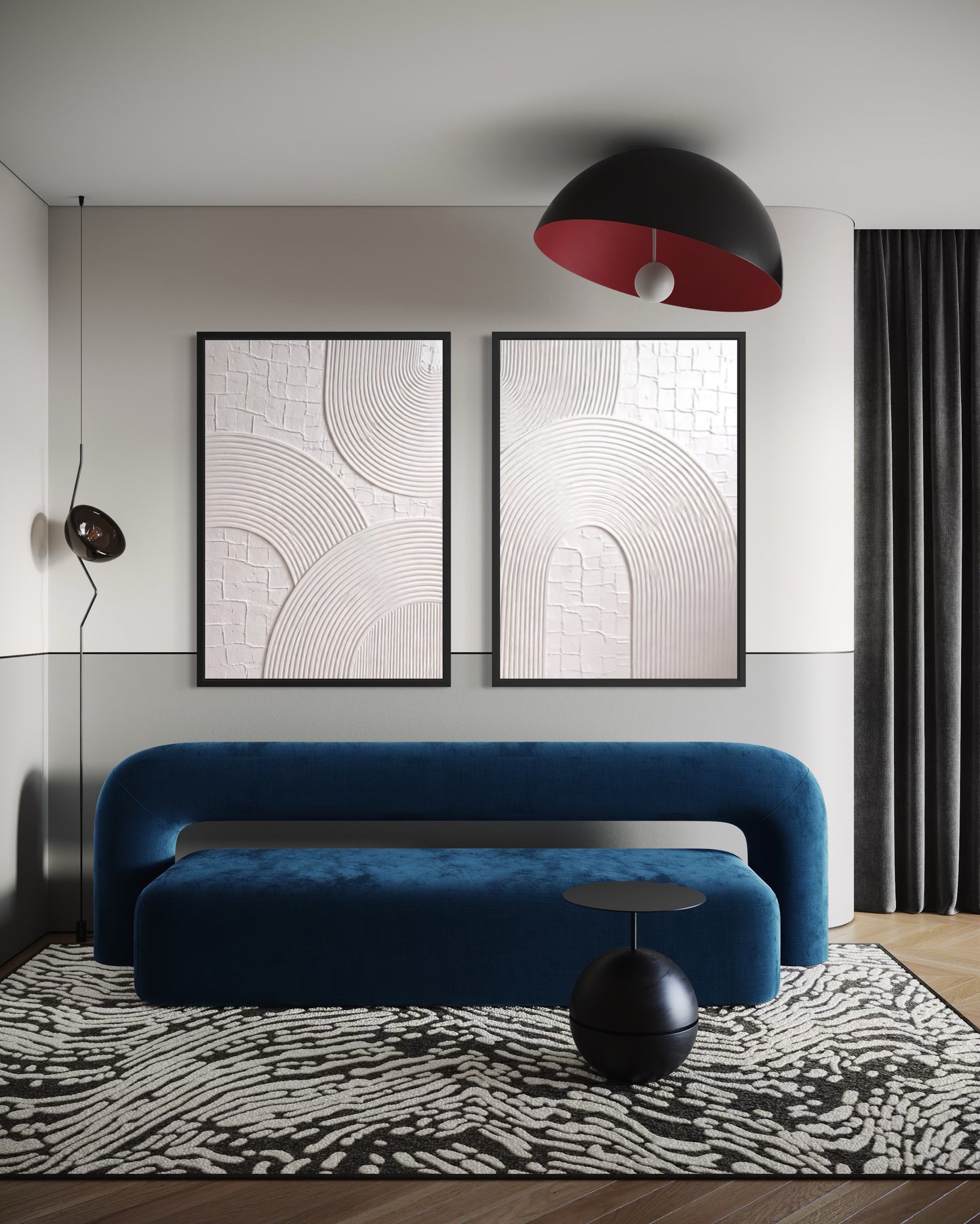 Modern living room with a blue sofa, abstract art, and a unique pendant light.
