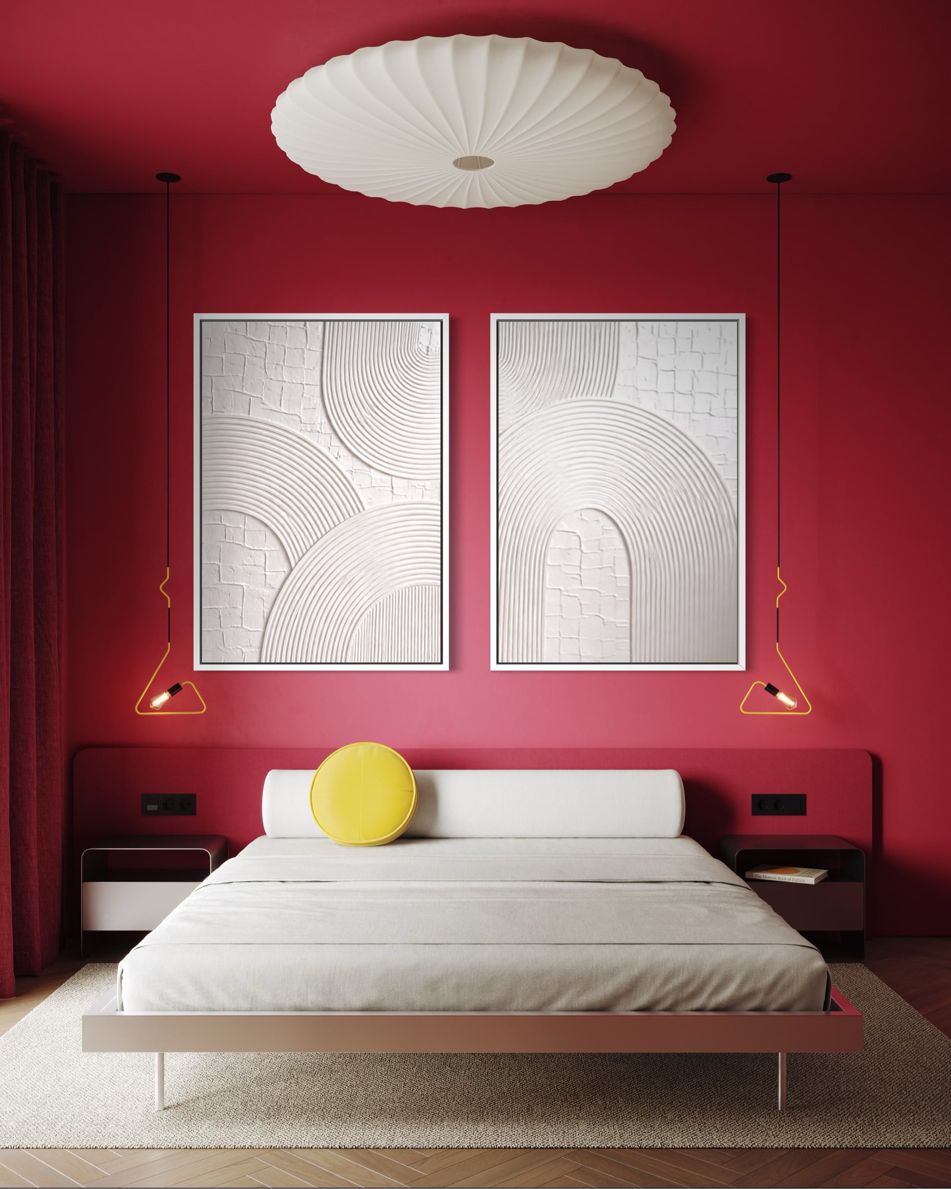 Modern bedroom with red walls, white bed, and abstract wall art.