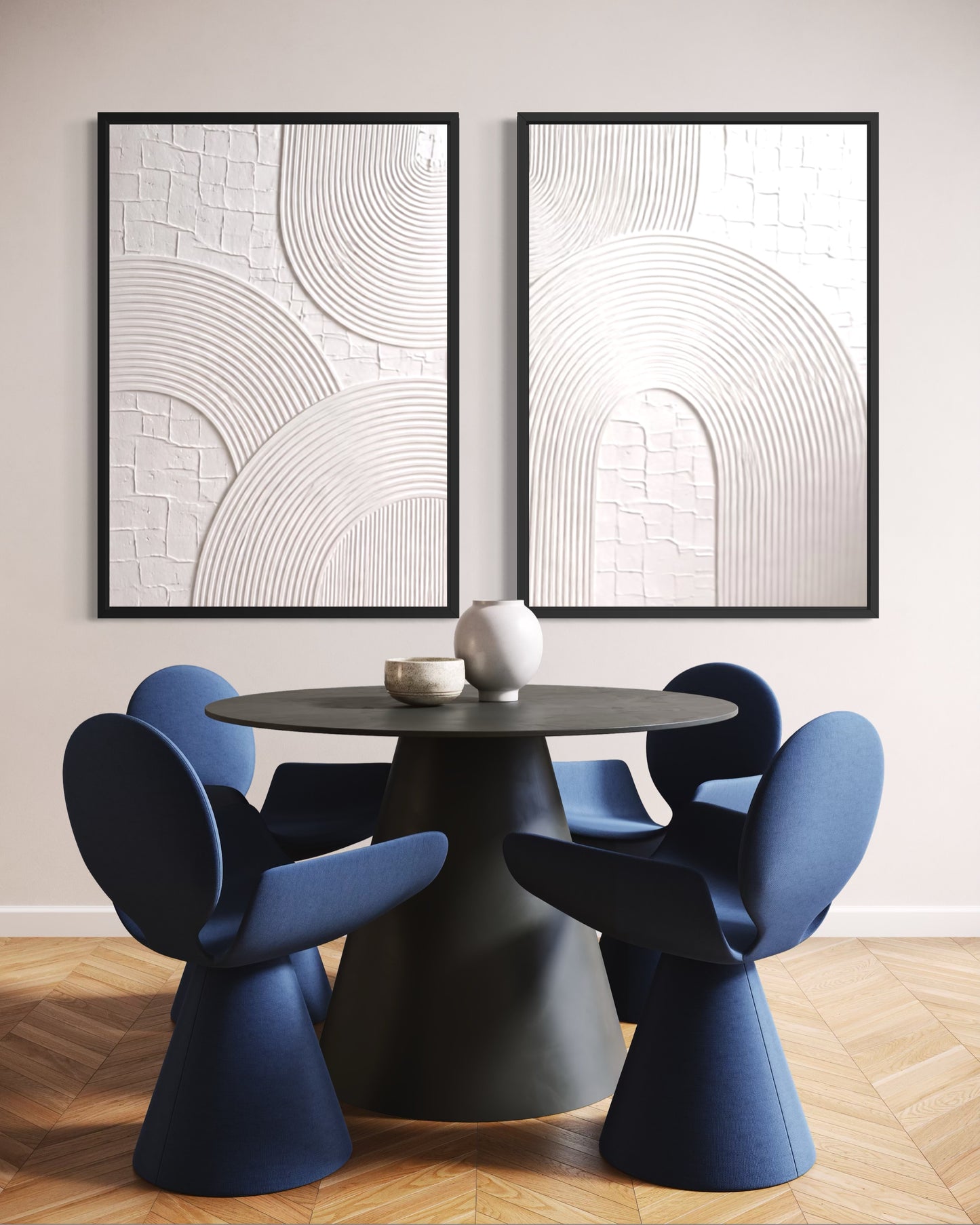 Modern dining room with blue chairs and a black table, featuring abstract wall art.